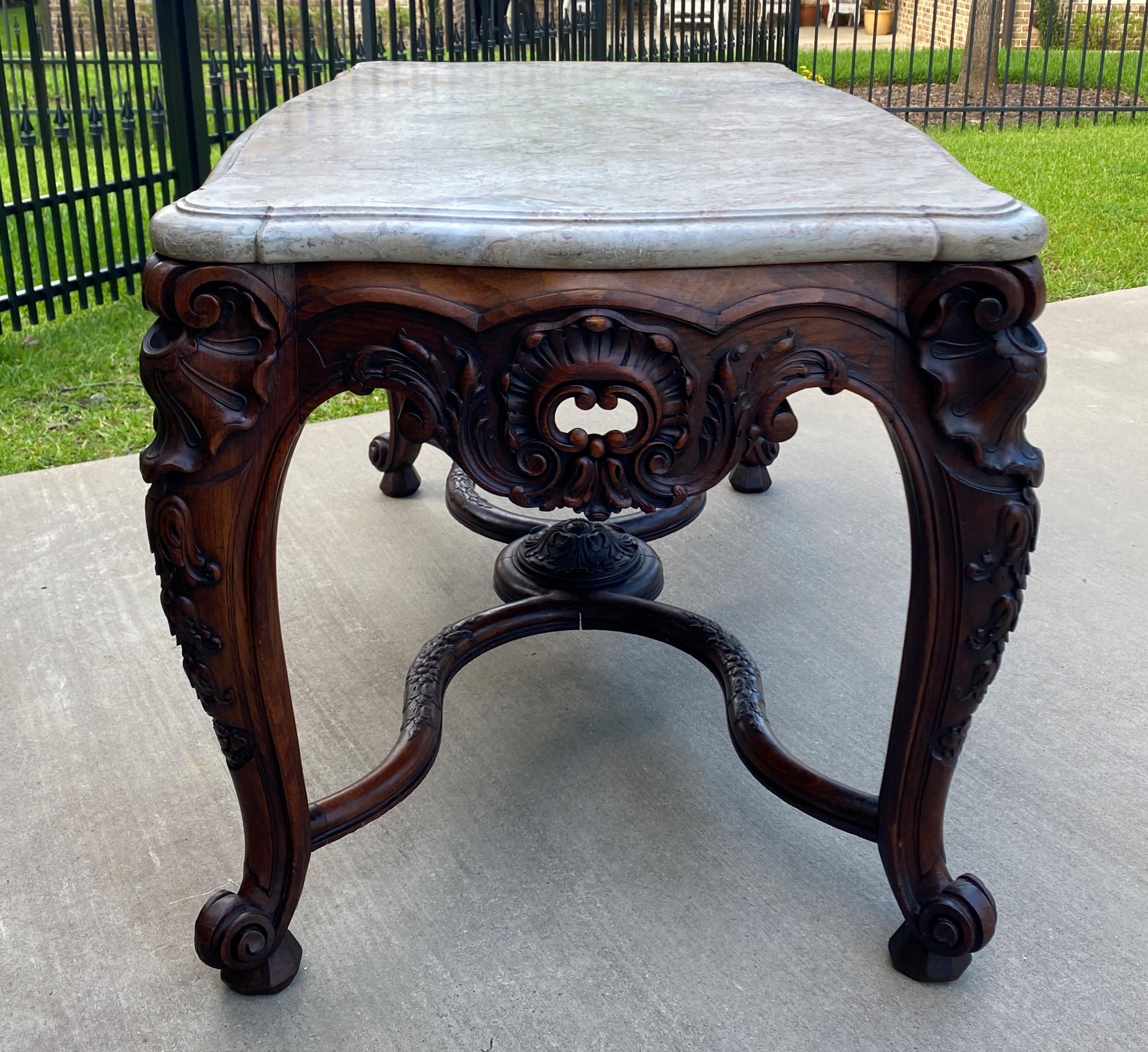Exquisite antique French walnut Louis XV style highly carved console or sofa table with marble top~~c. 1900
Highly carved antique French Louis XV style walnut console or sofa table with shaped marble top over highly carved pierced foliate shell 8