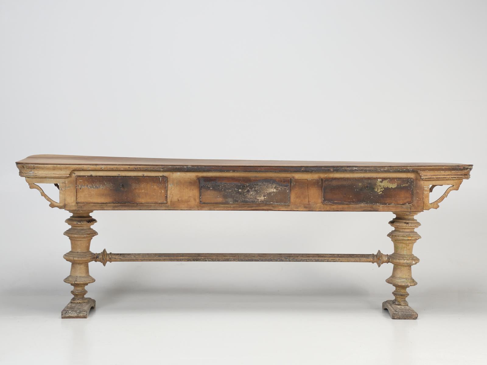 Antique French console table, sofa table or? Our belief is, that this antique French table was probably used in a commercial application, possible as a desk, where you might register in a small boutique hotel? Difficult to pinpoint the exact usage,