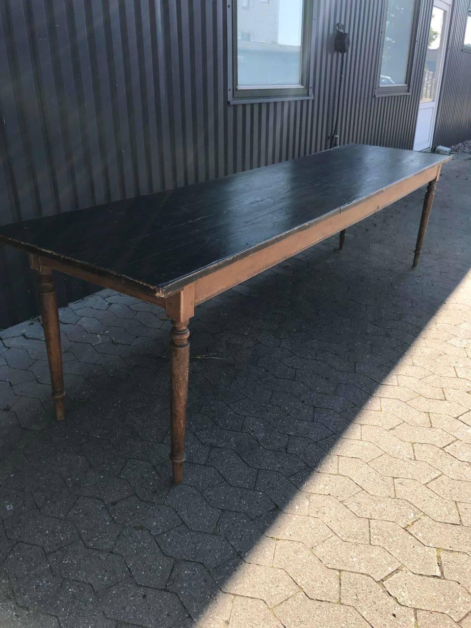 Lovely antique French wooden refectory long table. Provenance – a convent from the South of France. Beautiful dark paintwork on the table top contrasting with the paler legs, good condition and glossy patina.