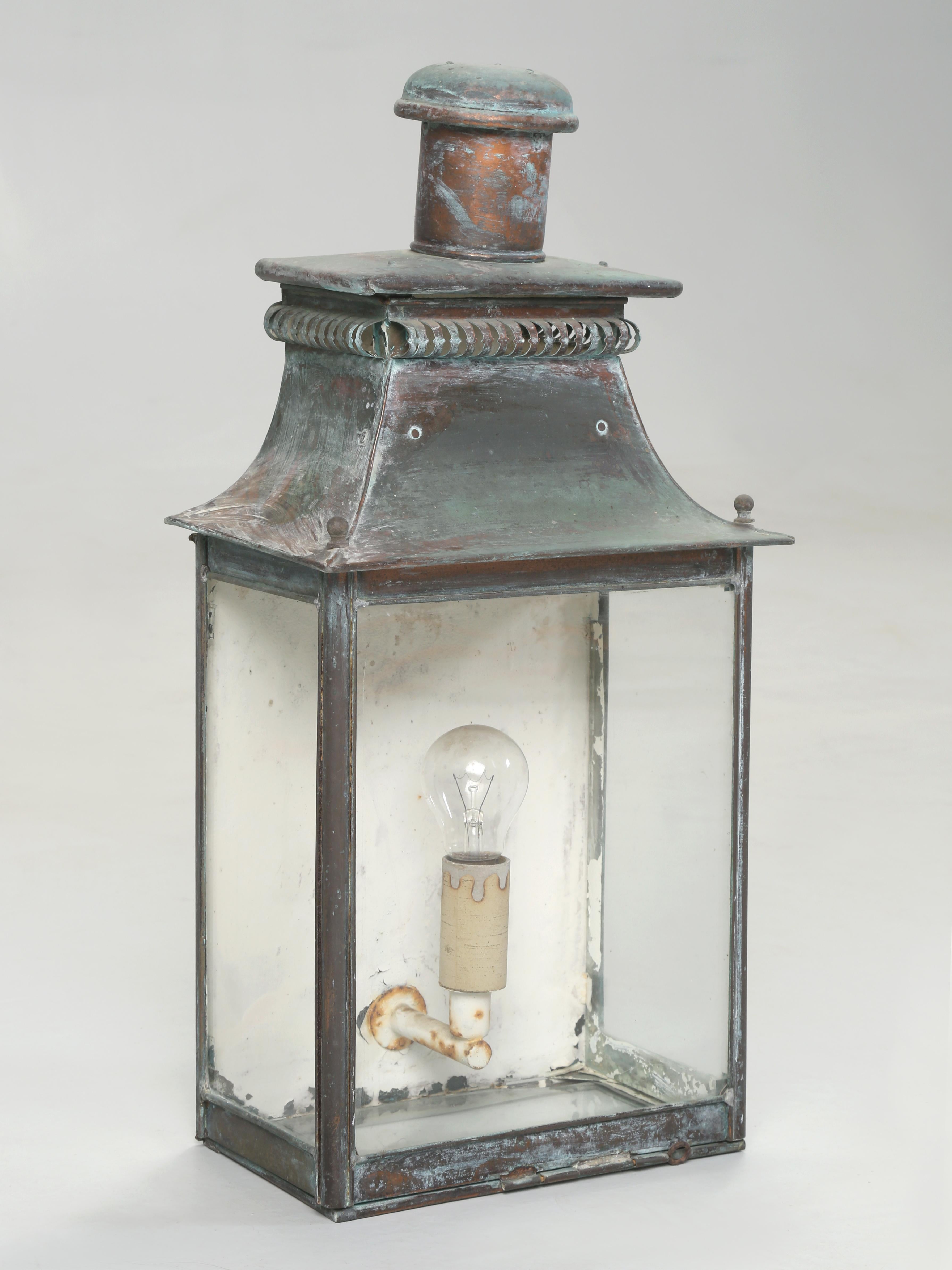 Antique French Wall Lantern with an incredible all Original Natural Patina. Made from Solid Copper and looks to be from the late 1800's or possibly the very early 1900's. We have left the Antique Copper Lantern in as found condition, for once they