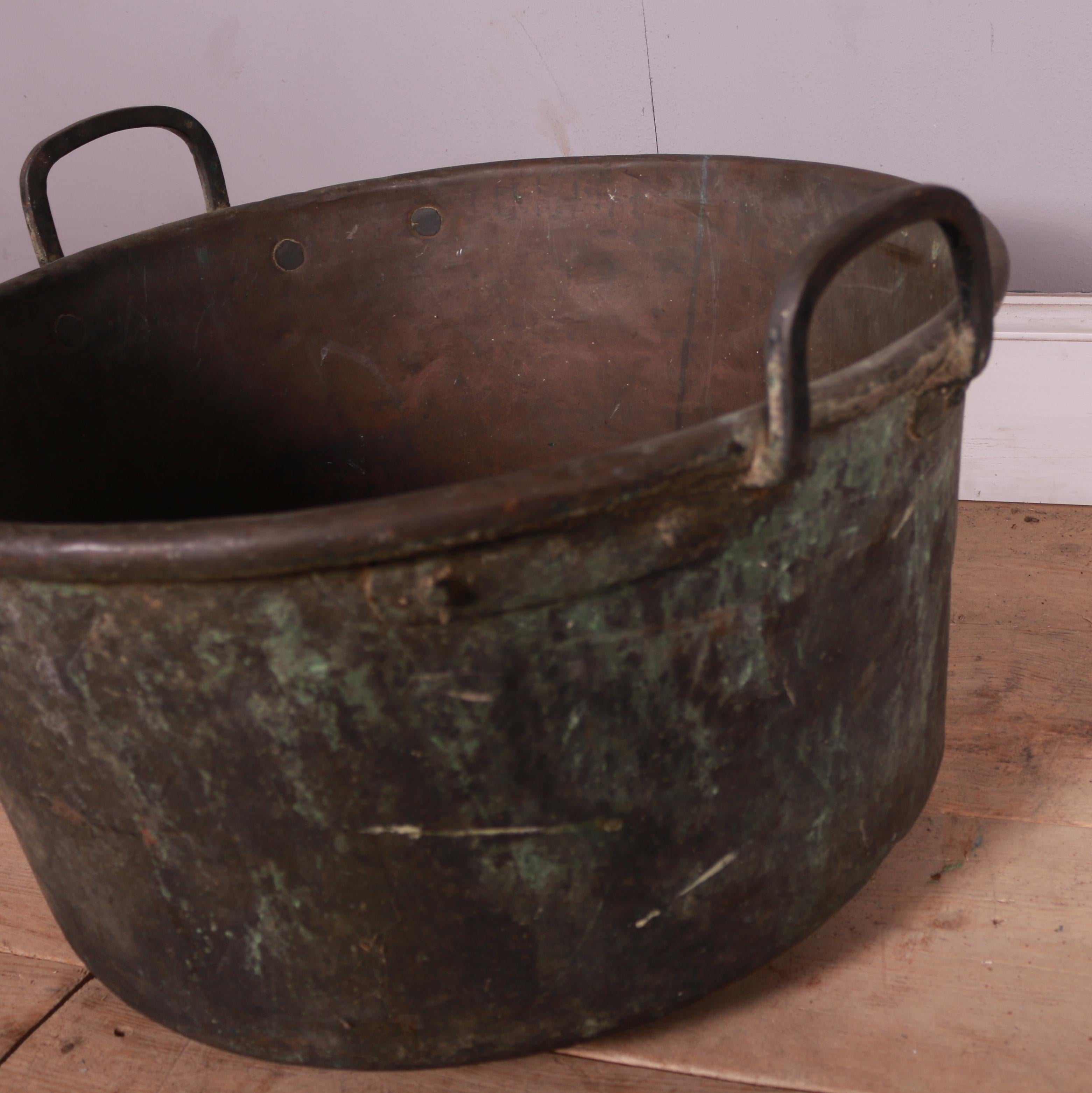 19th century French copper cauldron with rounded rim and riveted iron handles. Great patina. 1890.

Reference: 7486

Dimensions
16 inches (41 cms) High
24.5 inches (62 cms) Diameter.