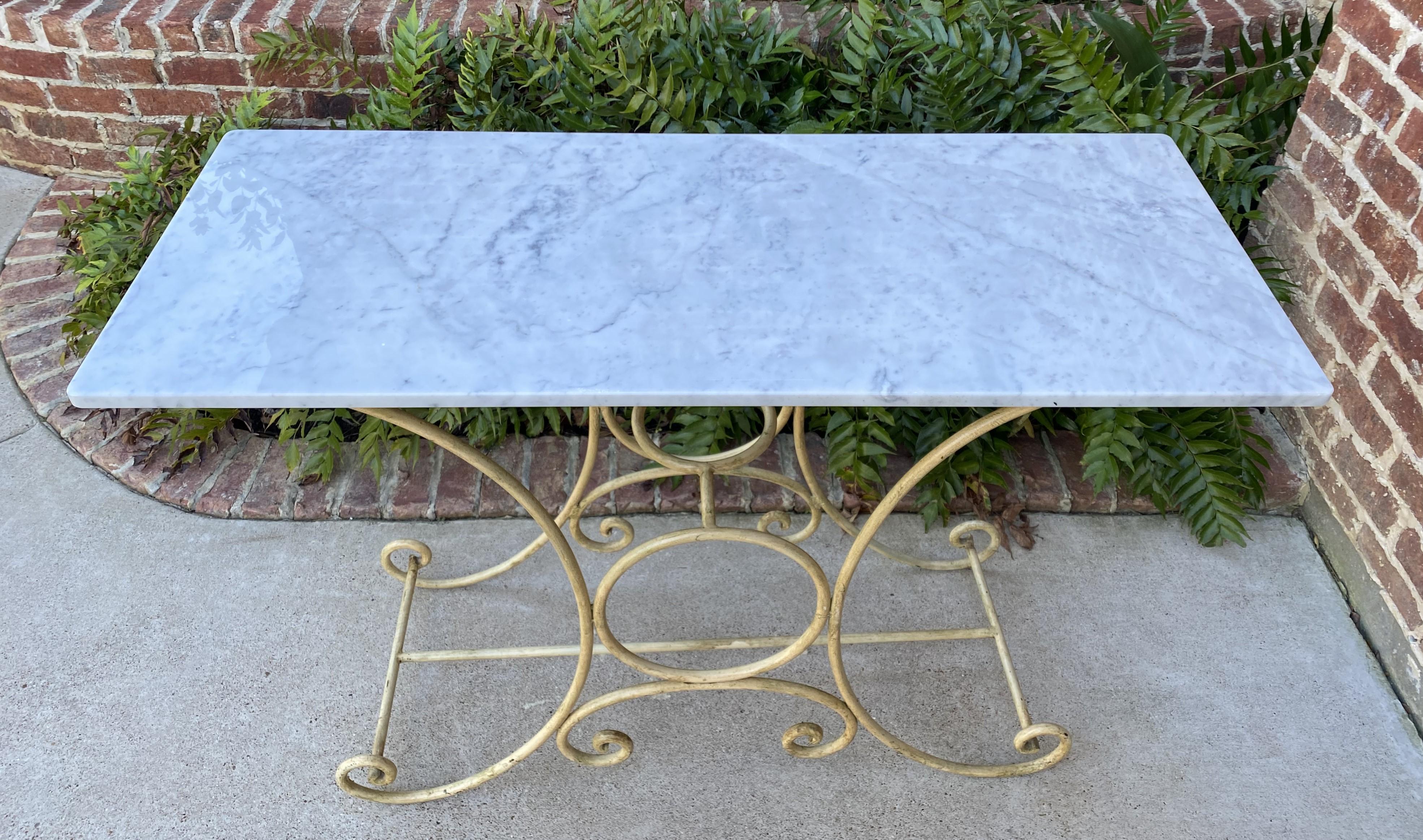 Antique French Country Baker's table pastry table~~Polished Carrara marble top and scrolled iron base

These tables were originally used by bakeries for kneading bread and pastries~~so hard to find this in condition

This beautiful table has the
