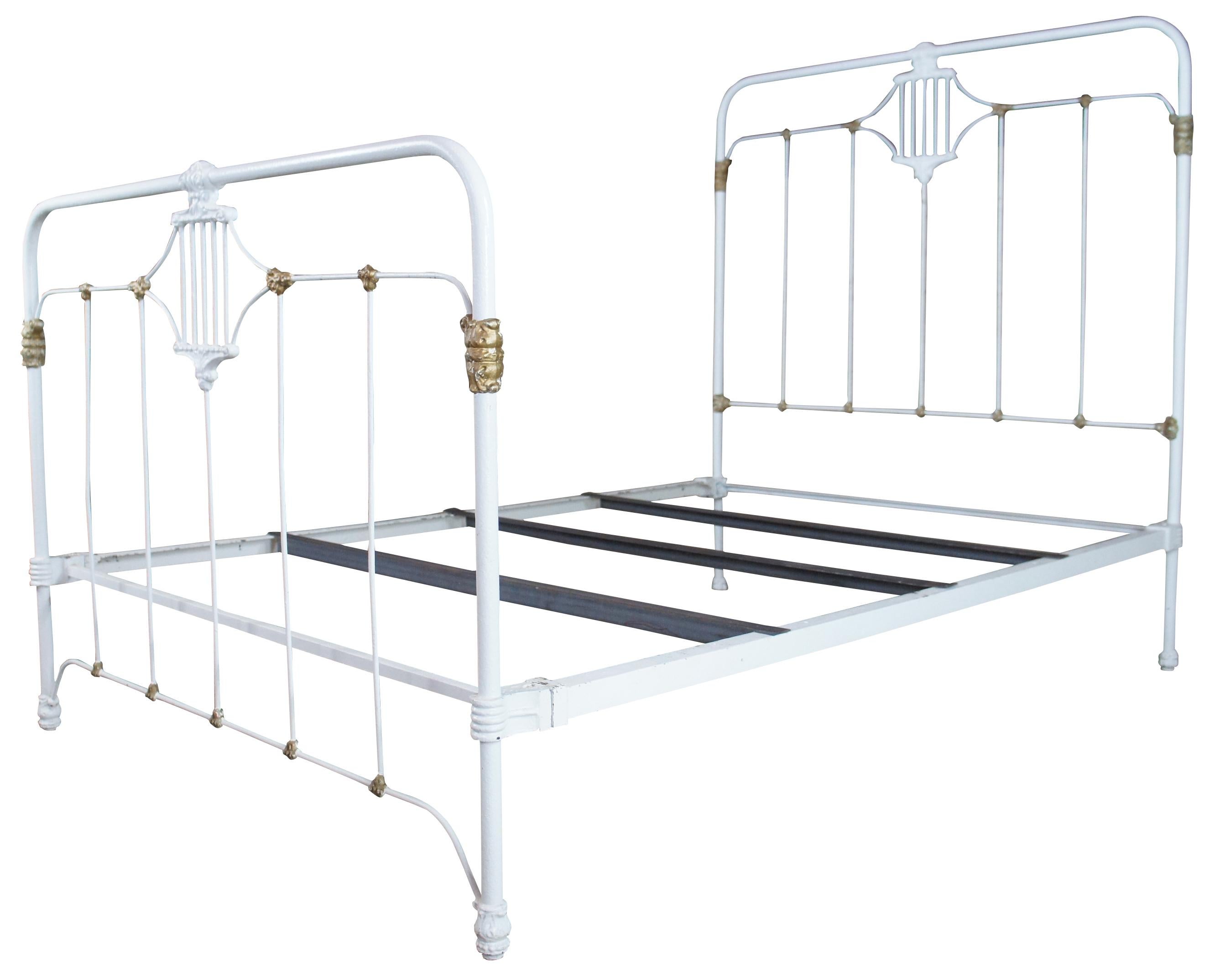Antique cast iron bed frame. Painted white and gold with French styling.

Foot board height 40.5