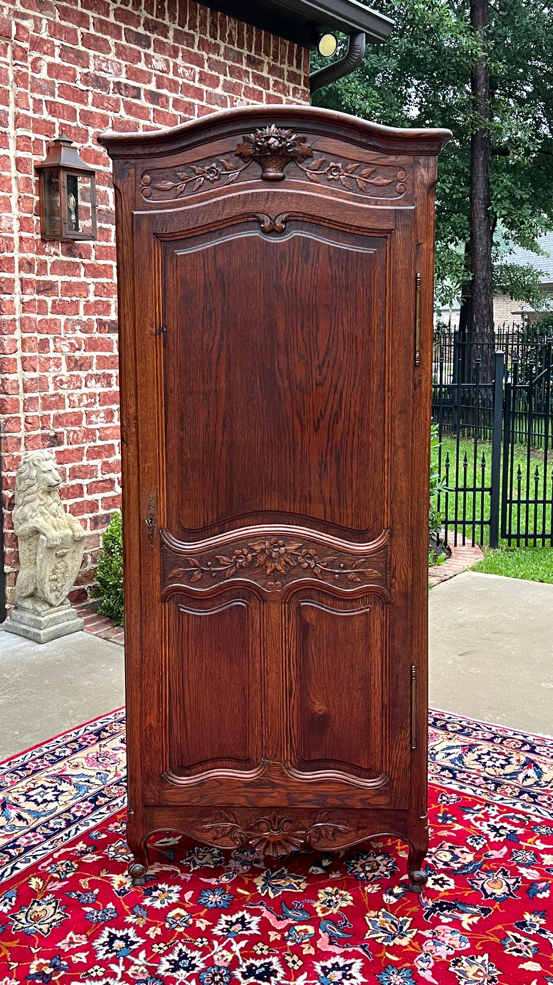    SUPERB Antique French Country Oak Armoire, Wardrobe, Linen Cabinet/Closet with Whorl Feet and Interior Shelves~~c. 
1930s 


        BEAUTIFUL STATEMENT PIECE~~early 20th century French oak armoire or wardrobe  with key~~excellent storage item