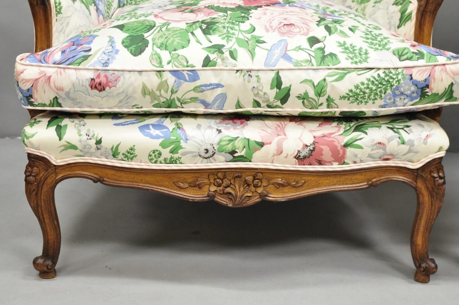XX secolo Antique French Country Louis XV Style Carved Walnut Bergere Wingback Chairs Pairée in vendita