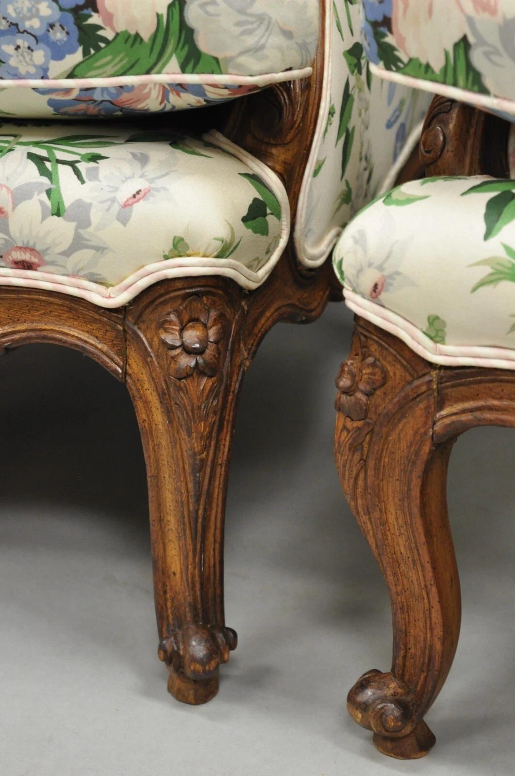 Noce Antique French Country Louis XV Style Carved Walnut Bergere Wingback Chairs Pairée in vendita