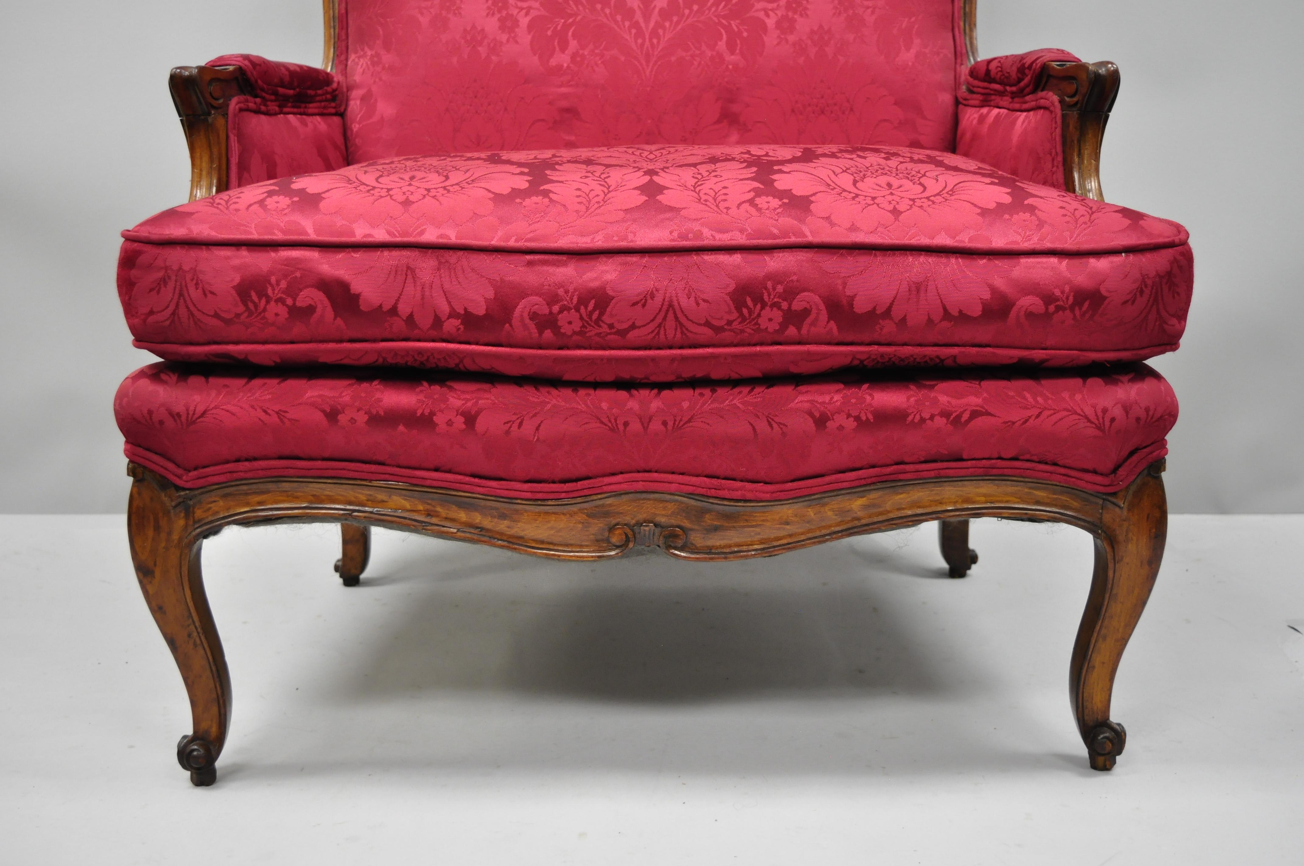 Carved Antique French Country Louis XV Style Walnut Burgundy Small Wingback Settee For Sale