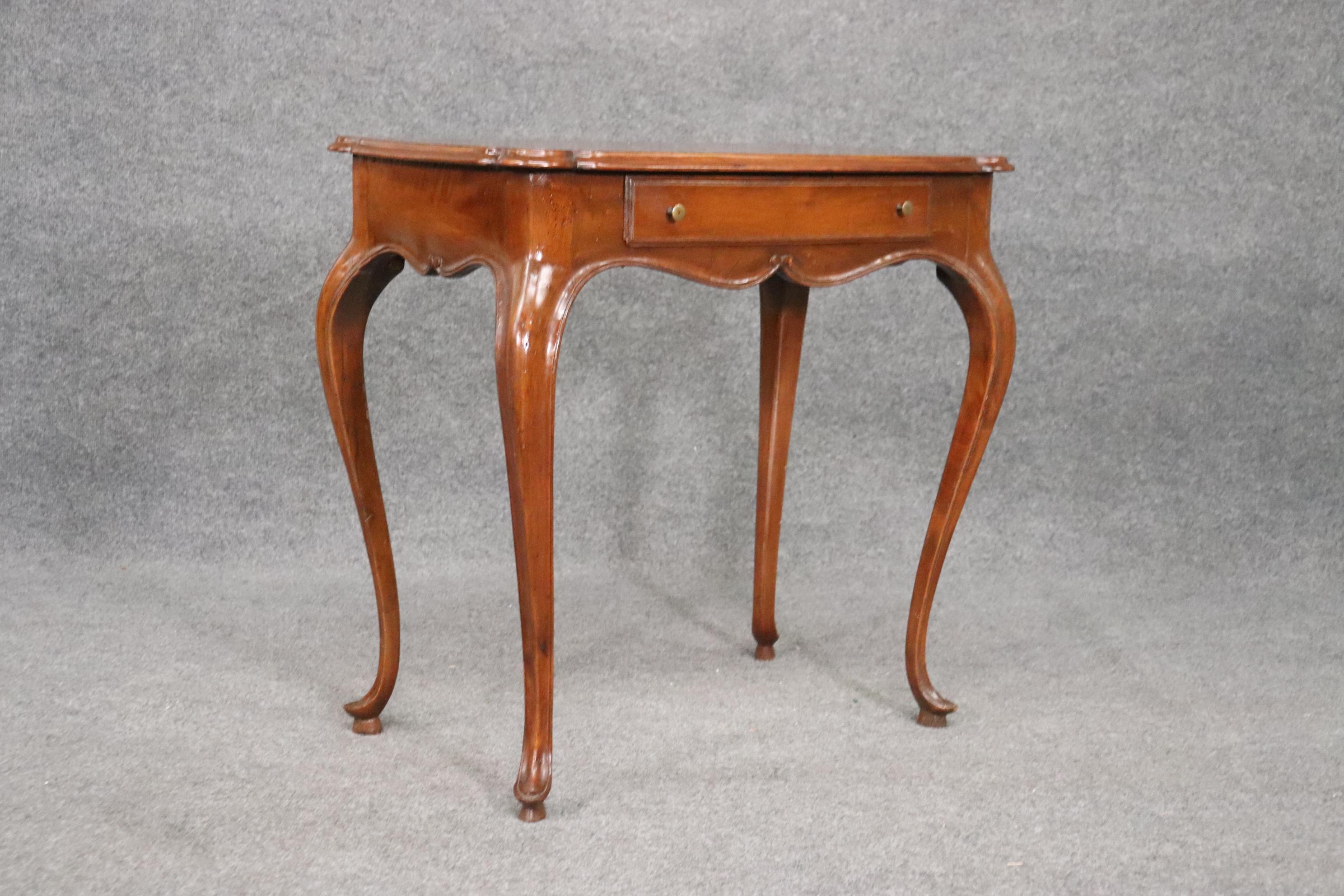 This is a fantastic antique French desk. The desk is in good condition and measures 19 inches deep x 31 wide x 30 inches tall. The desk dates to teh 1920s.