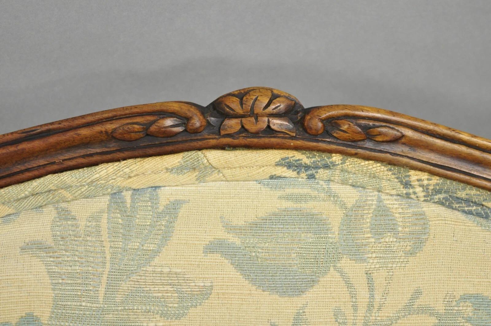 20ième siècle Antique French Country Provincial Walnut Carved Wingback Lounge Chairs Pair en vente