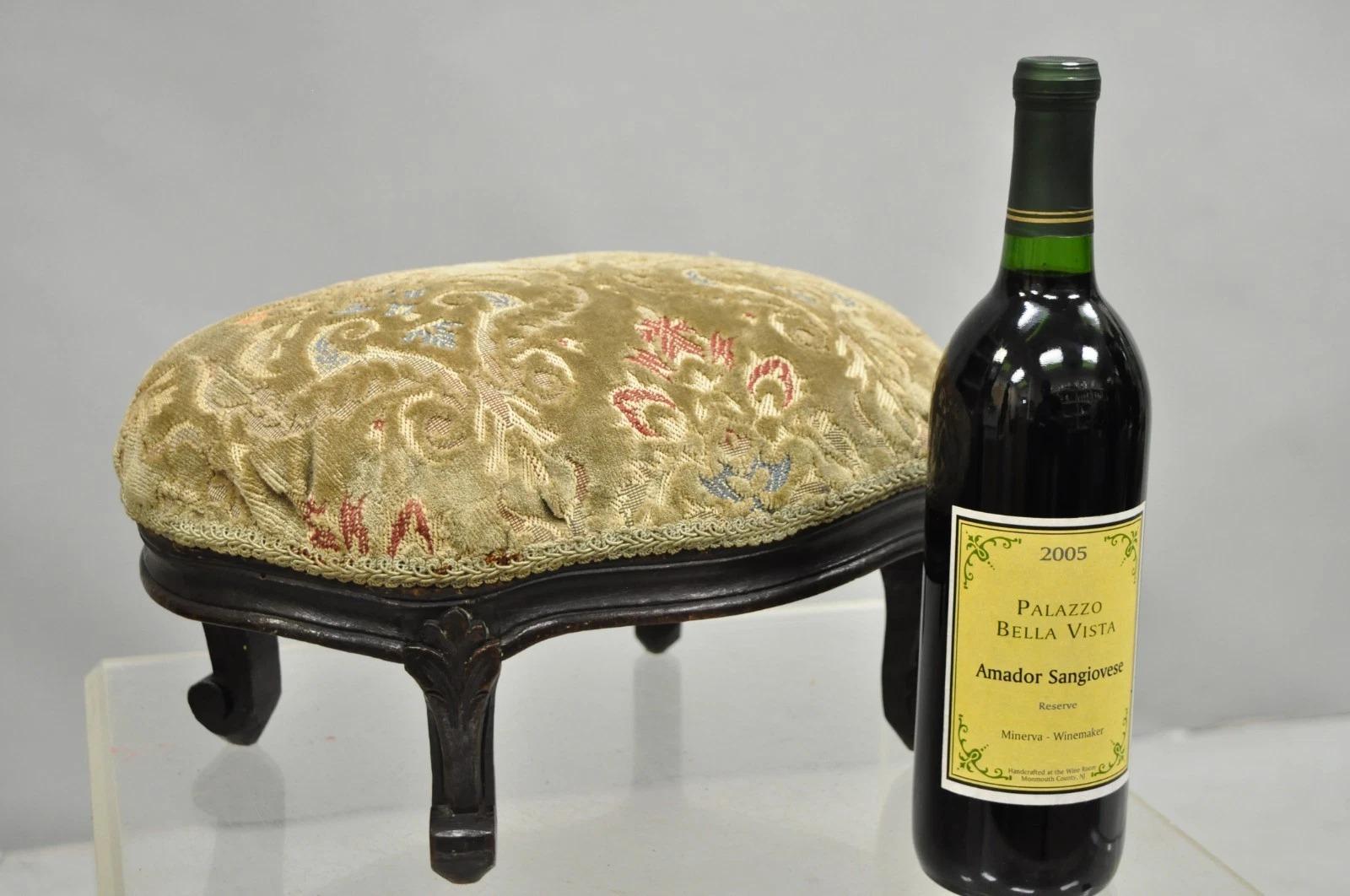 Antique French Country Provincial Oval Carved Walnut Petite Footstool Ottoman. Circa Early 20th Century. Measurements: 7