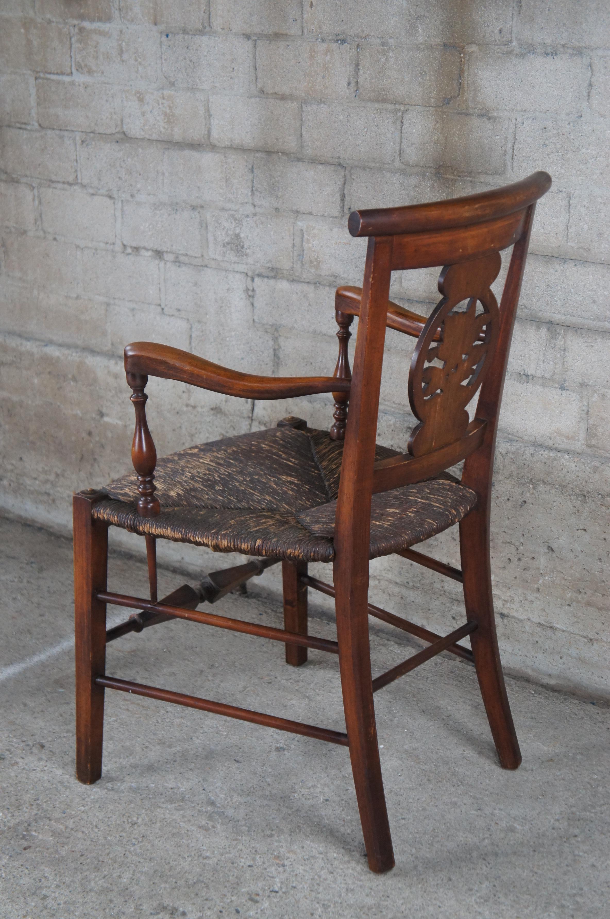 20th Century Antique French Country Walnut Carved Fireside Arm Chair Woven Rush Seat Floral  For Sale