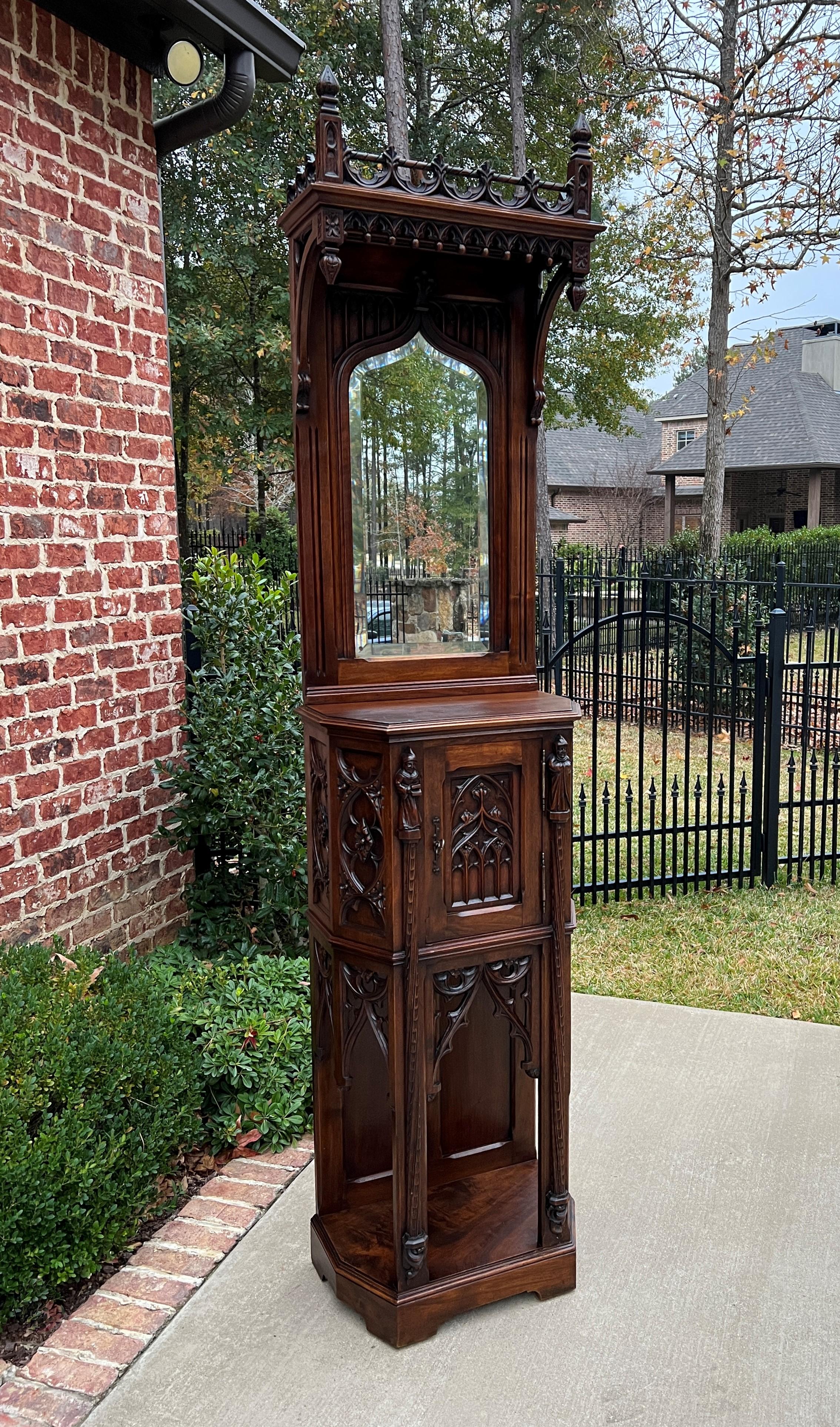 Antique French Gothic Revival Carved walnut mirrored credence cupboard or cabinet~~versatile size~~c. 1880s

 Charming antique cabinet in popular French Gothic Revival style~~upper canopy with pierced gallery and drop finials, lower single cabinet