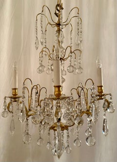 Antique French Crystal and Gold Bronze Chandelier, Circa 1910-1920.