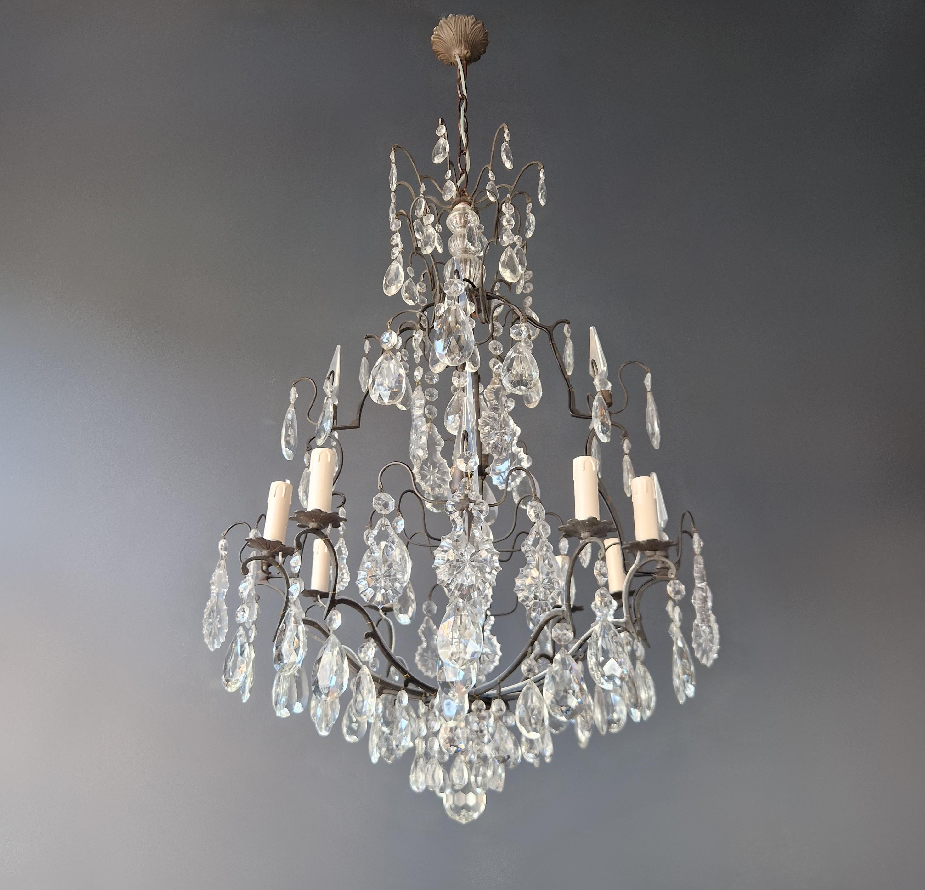 For sale is a stunning old chandelier that has been lovingly and professionally restored in Berlin. Its electrical wiring is compatible with the US, as it has been completely re-wired and is ready to be hung. Each crystal has been meticulously