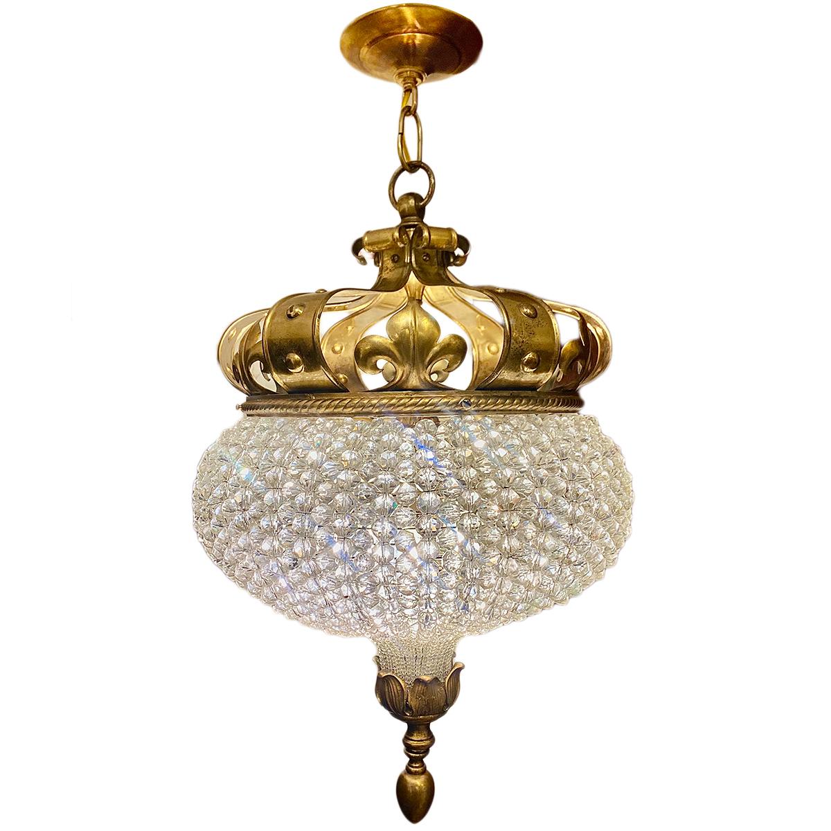 A circa 1900 French gilt bronze and crystal lantern.

Measurements:
Diameter: 16.5