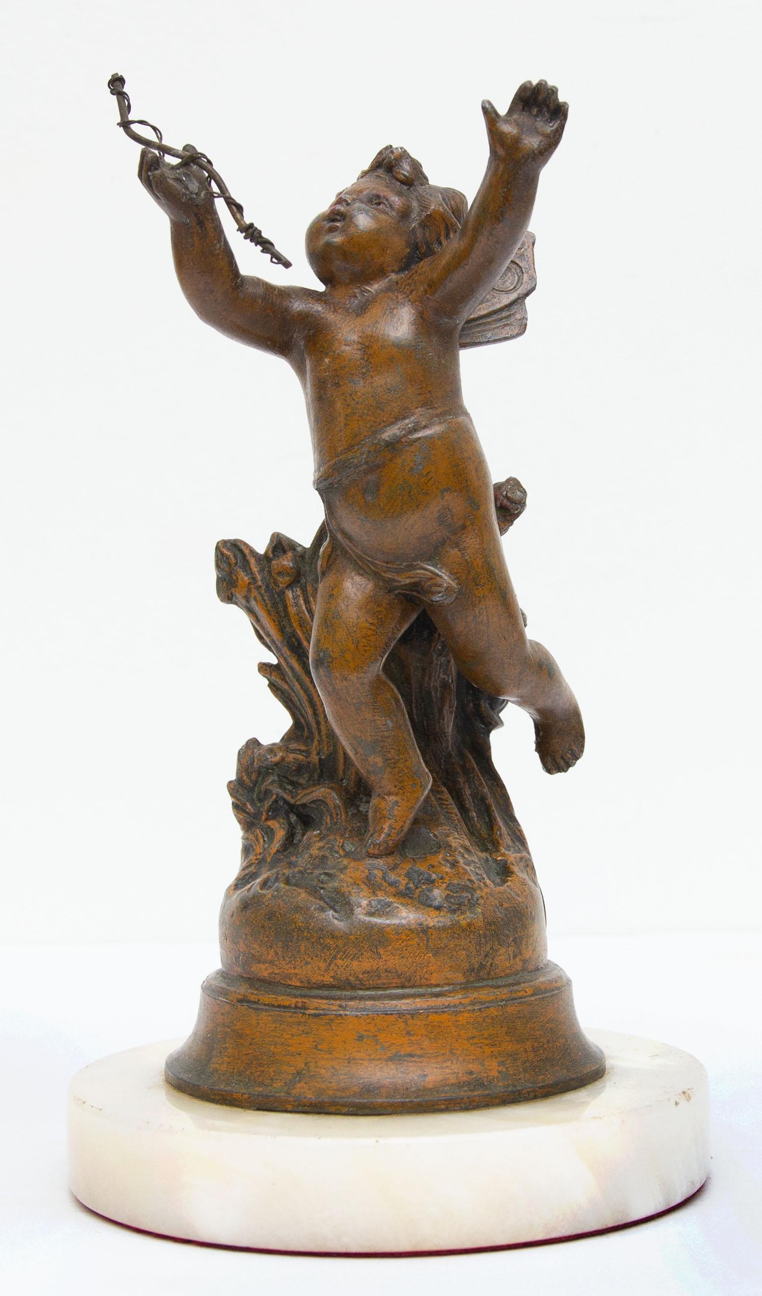 French flying cupid sculpture on a marble base. 19th century spelter. French foundry seal.