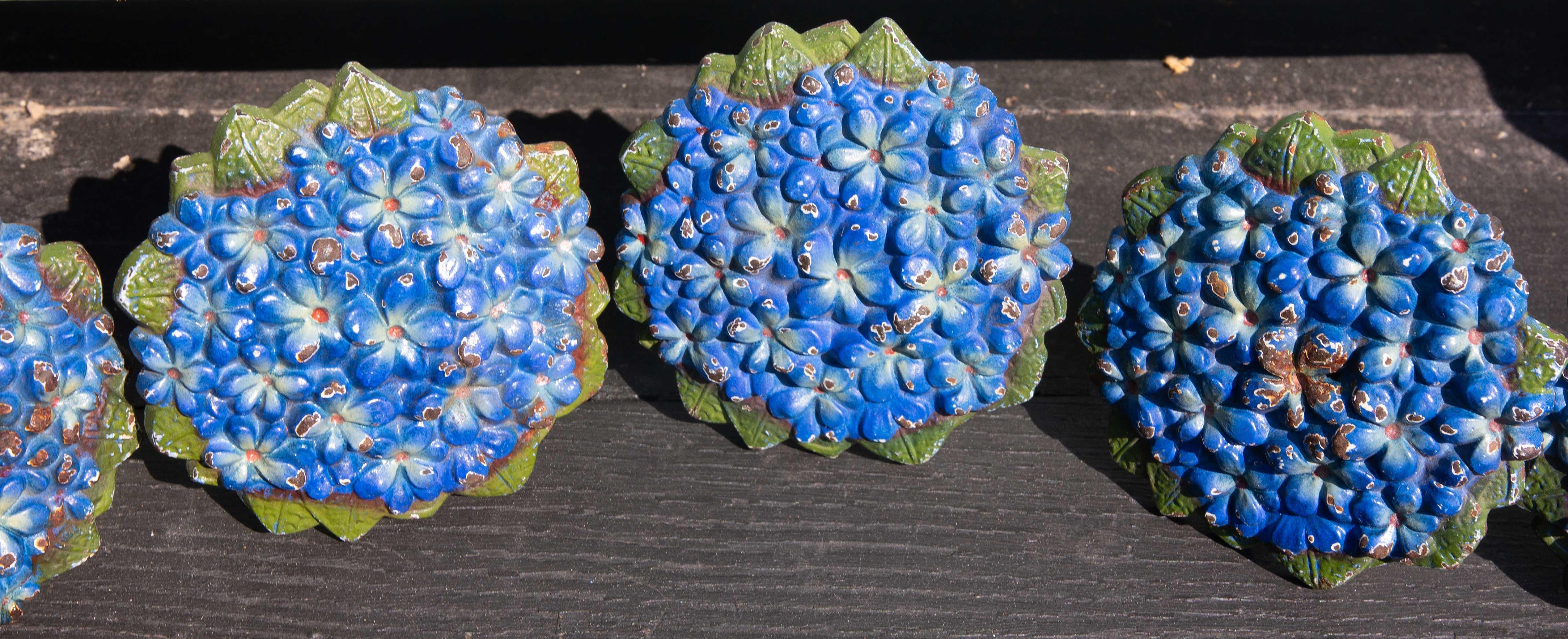 Unusual set of five antique enameled blue floral curtain tie backs. French. 19th century. 