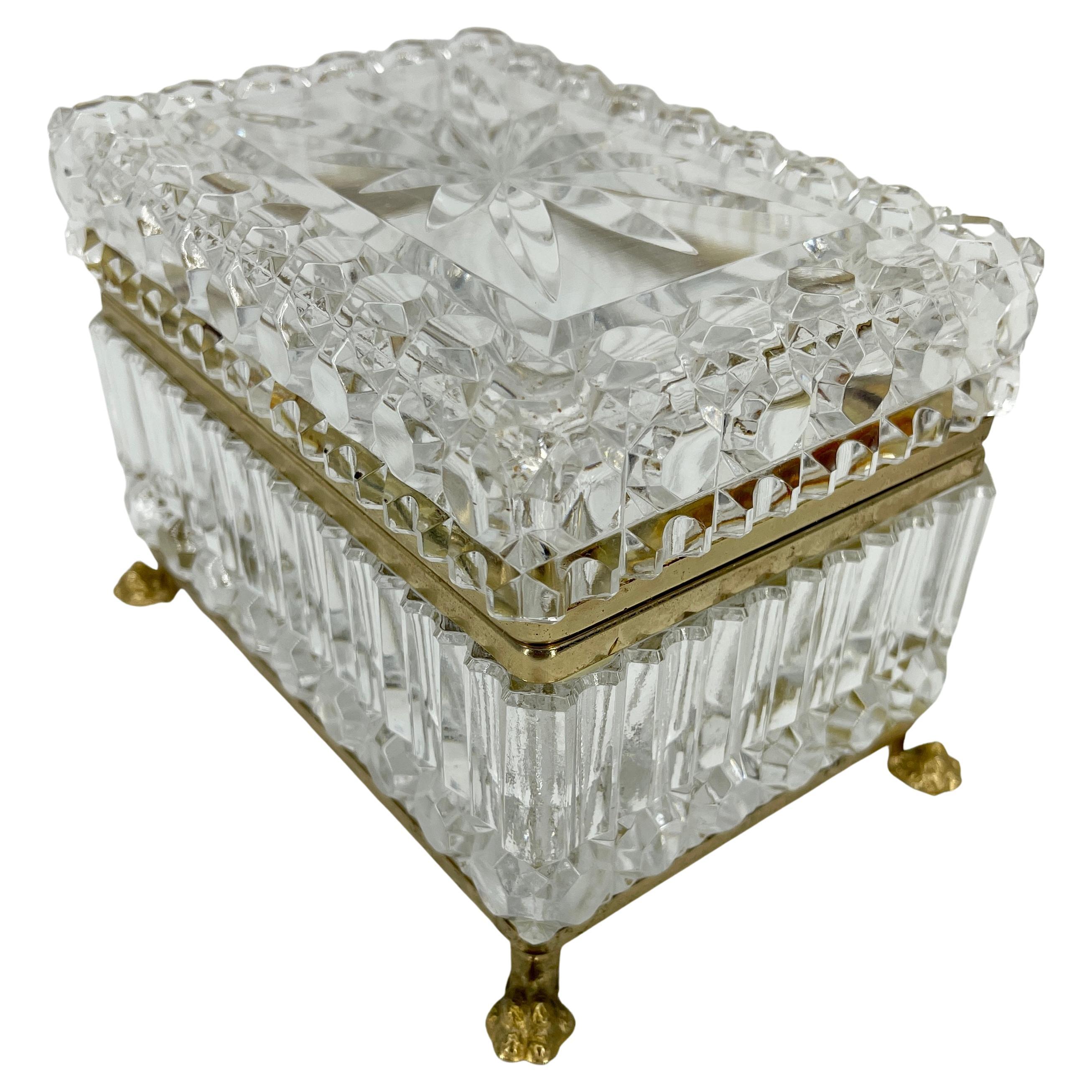 Antique pointed cut crystal and brass jewelry or vanity box. This small cut crystal box with gilded feet is perfect as a desk accessory, a candy dish, a vanity box or jewelry box. The lovely crystal box makes a statement in any decor and room. An