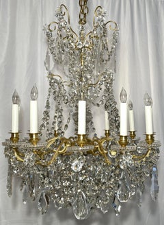 Antique French Cut Crystal and Gold Bronze 12-Light Chandelier, Circa 1875-1895.