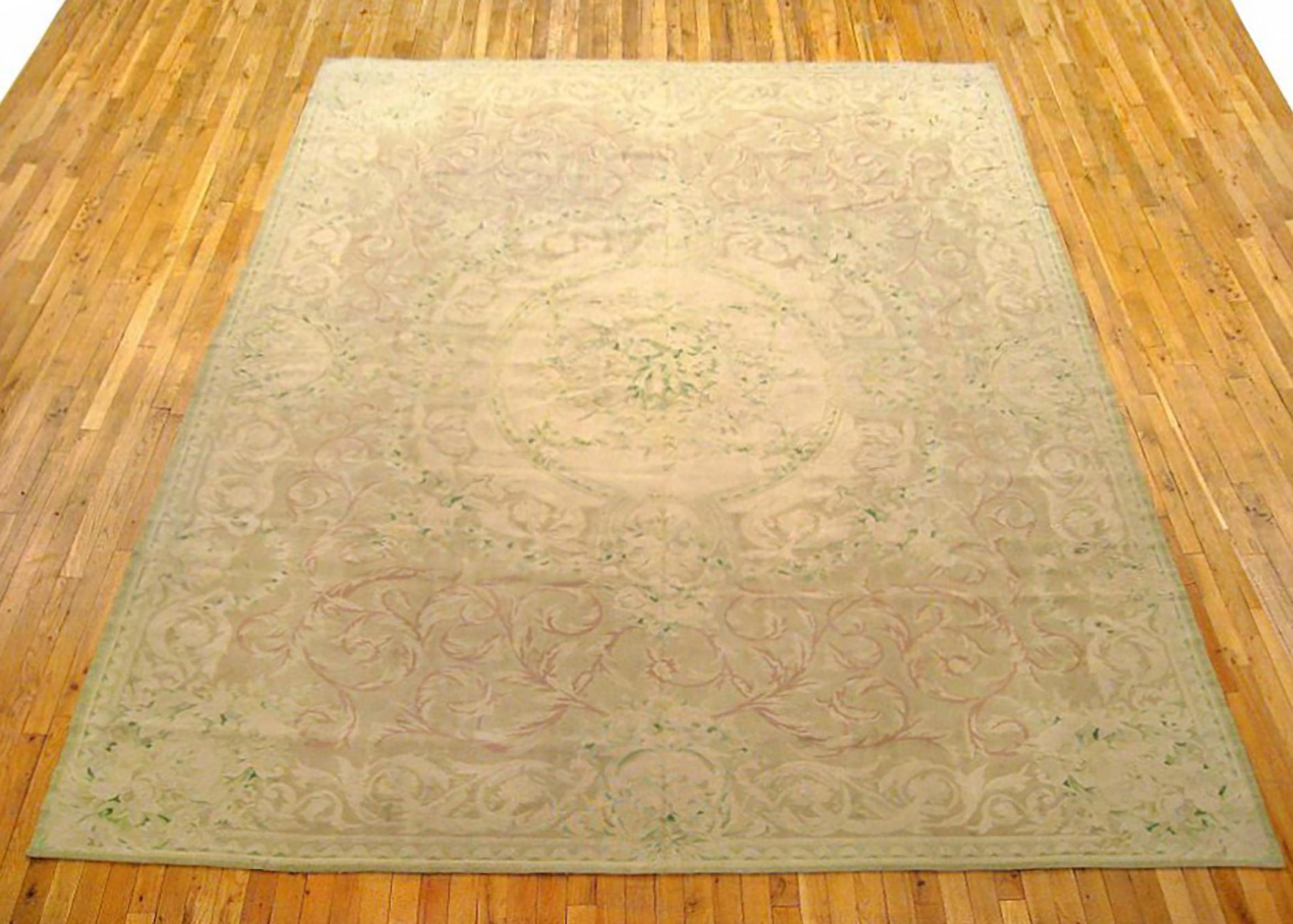 Antique French Aubusson Rug, Room size, circa 1910

A one-of-a-kind antique French Aubusson Carpet, hand-knotted with soft wool pile. Featuring a central medallion on the soft red primary field, with a delicate ivory outer border. decorated with