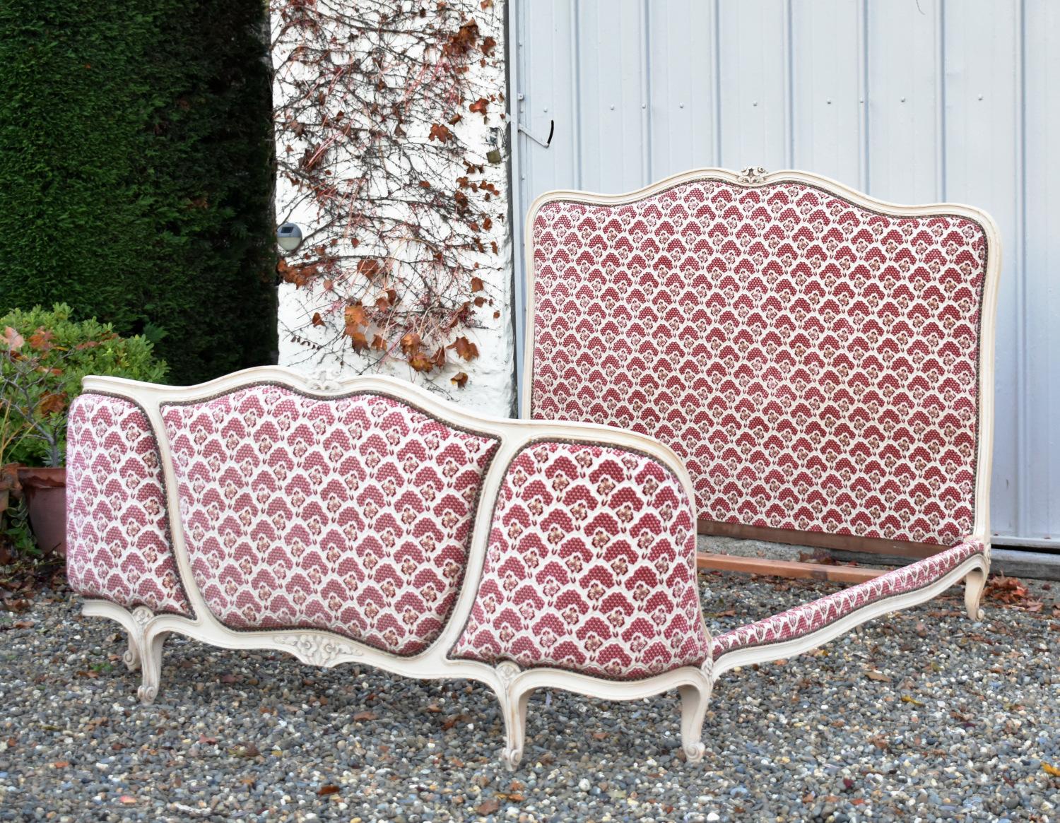 Attractive French Demi-Corbeille bed (Early 20th Century) Louis XV Style 

This beautifully curved frame retains its original bone coloured paint with floral decoration to the head and foot boards. 

The bed sits on elegantly carved feet with