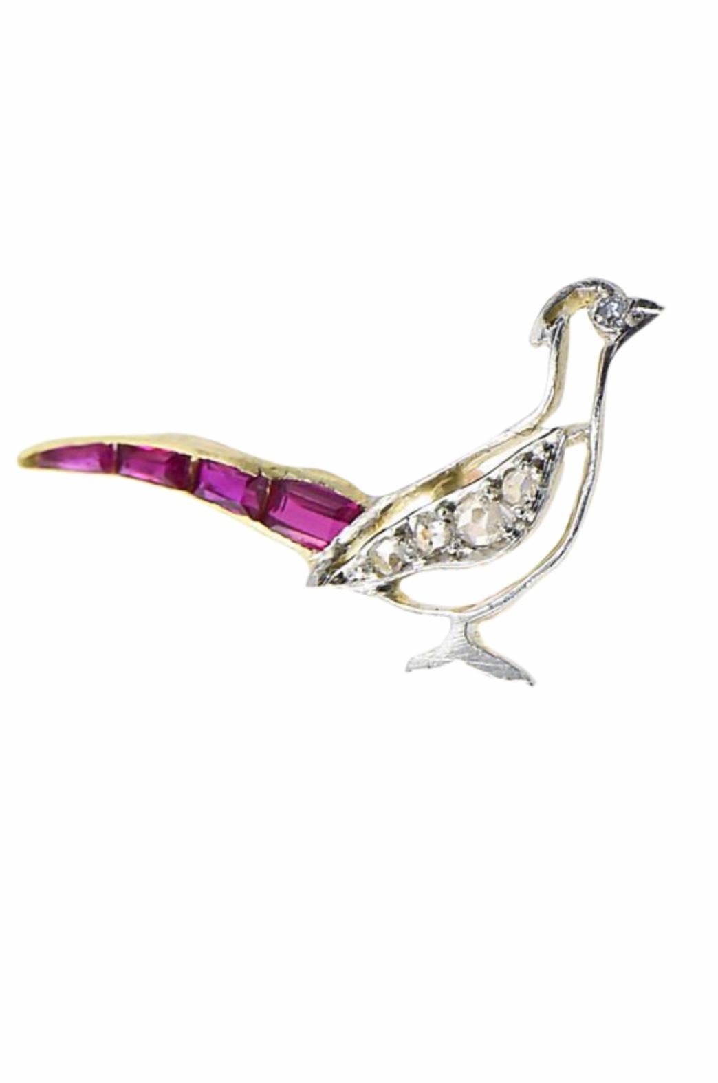Antique French 18K gold stickpin featuring channel-set synthetic ruby tail and diamond body mounted in gold. Marked with a French eagle hallmark on stickpin. Could be easily converted to a ring or pendant. 
