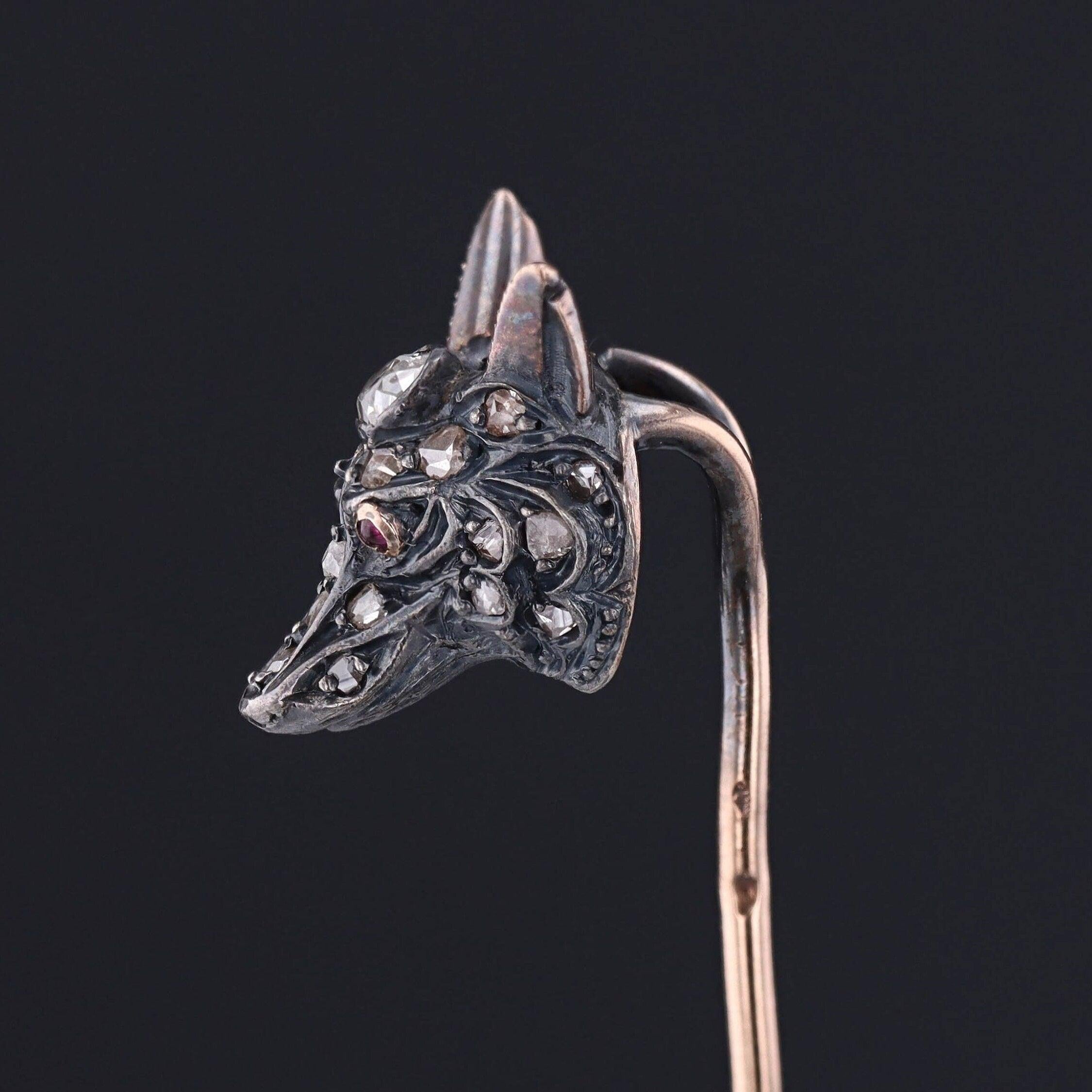 North American and Siberians revered the fox as a divine curer with the ability to lead shamans through paths not ordinarily visible to man. (The Book of Symbols: Reflections on Archetypal Images; Ami Ronnberg).

This antique stick pin (circa 1830)