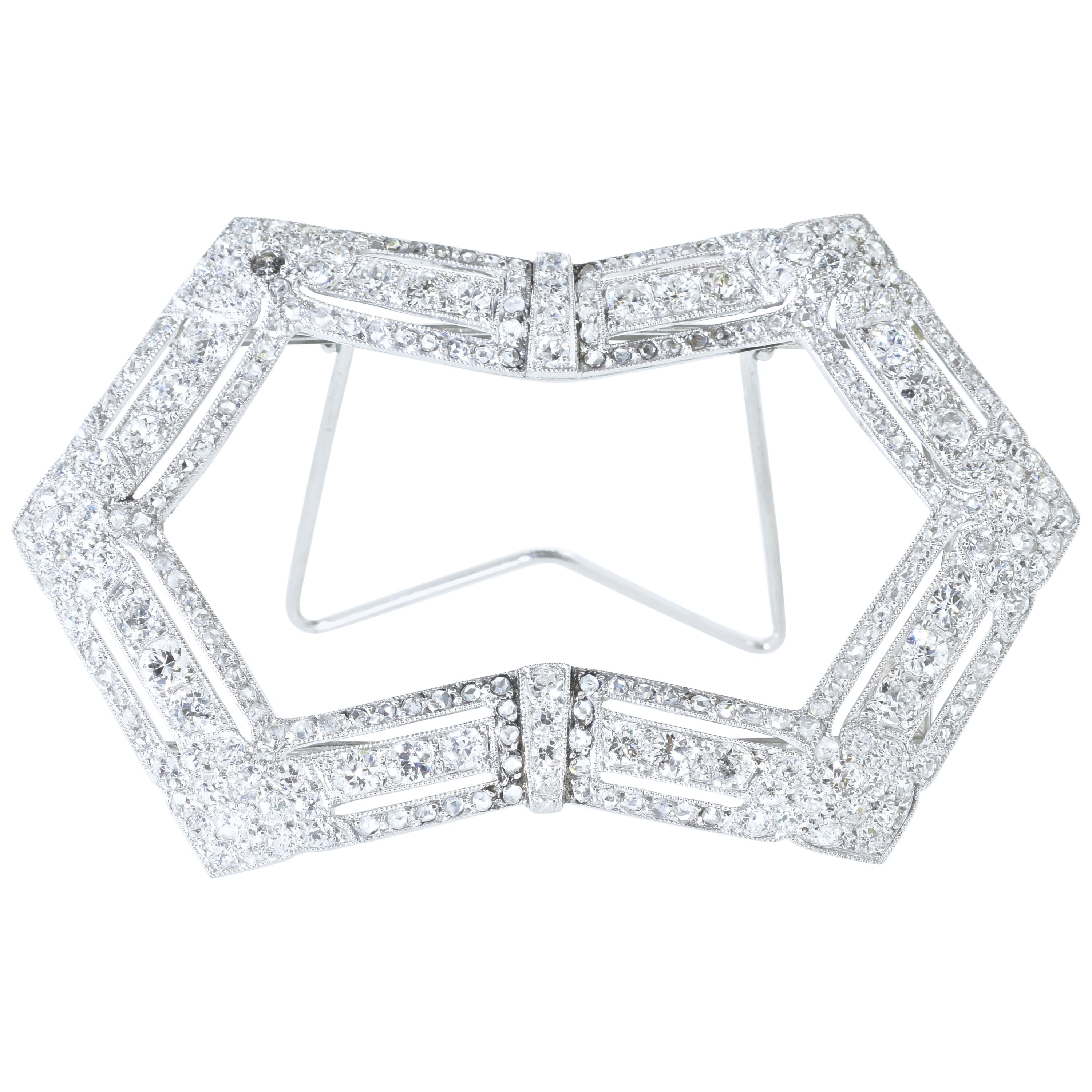 Antique diamond small desk size  frame for pictures is 2.5 inches by 1.5 inches.  It has approximately 5.5 cts of European, mine and rose cut diamonds.  The diamonds are white and bright.  A picture will fit within the back brackets.  this charming
