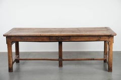Antique French dining table made of fruitwood from the late 18th century