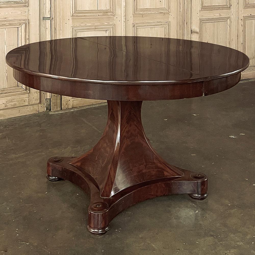 Antique French Directoire Mahogany Banquet Table with 3 Leaves will make a splendid addition to your entertaining, providing the versatility of an exquisitely understated elegance in a center table, yet expands to over 9 feet in length by adding the