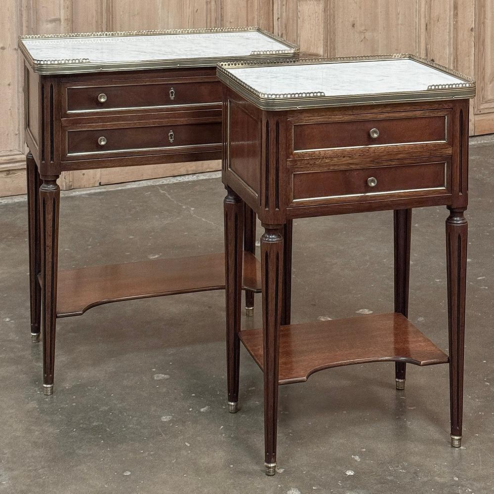 Antique French Directoire Mahogany End Table with Carrara Marble will make a delightful addition to your room, providing storage, display, perhaps a place for a lamp, convenient drawers, and tailored elegance that is truly timeless, all in one