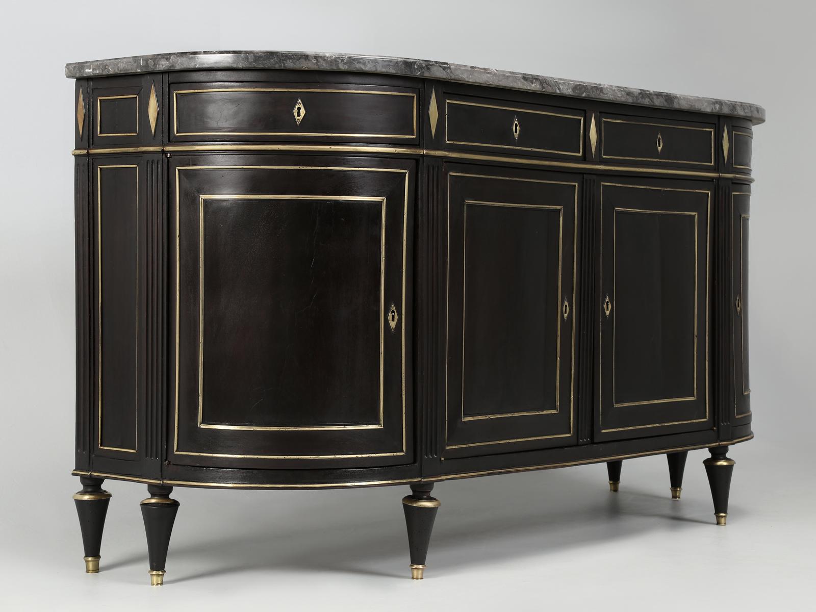 Classic antique French Directoire buffet, with some Louis XVI influences and rarely do you see Old Plank offer curved end antique French buffets. We were just as surprised ourselves, however, when we began to take a hard look at this antique French