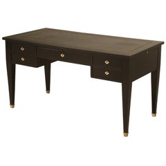 Antique French Directoire Style Desk in an Ebonized Finish and Restored Leather