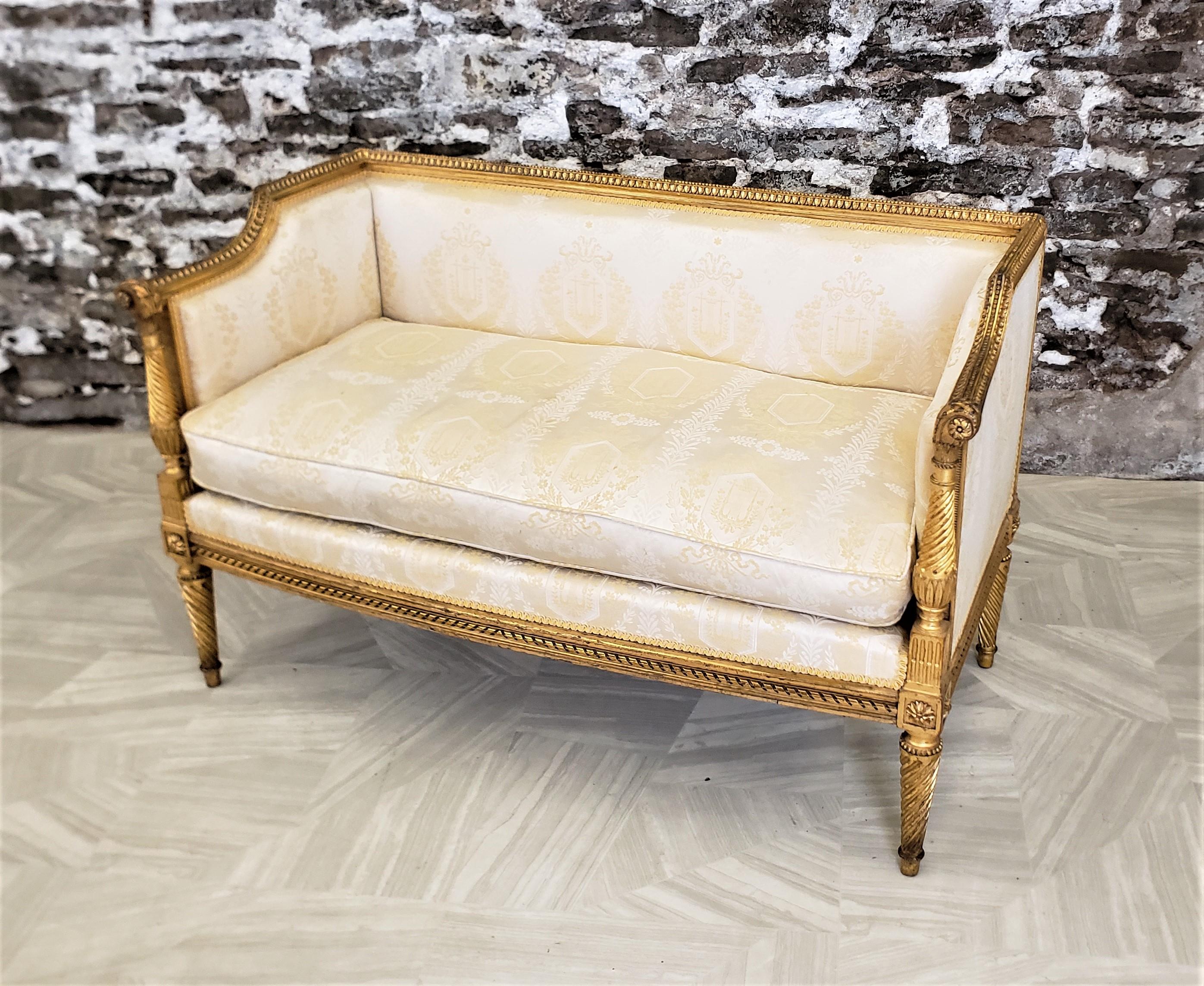 Fabric Antique French Directoire Styled Settee with Hand-Carved Giltwood Accents