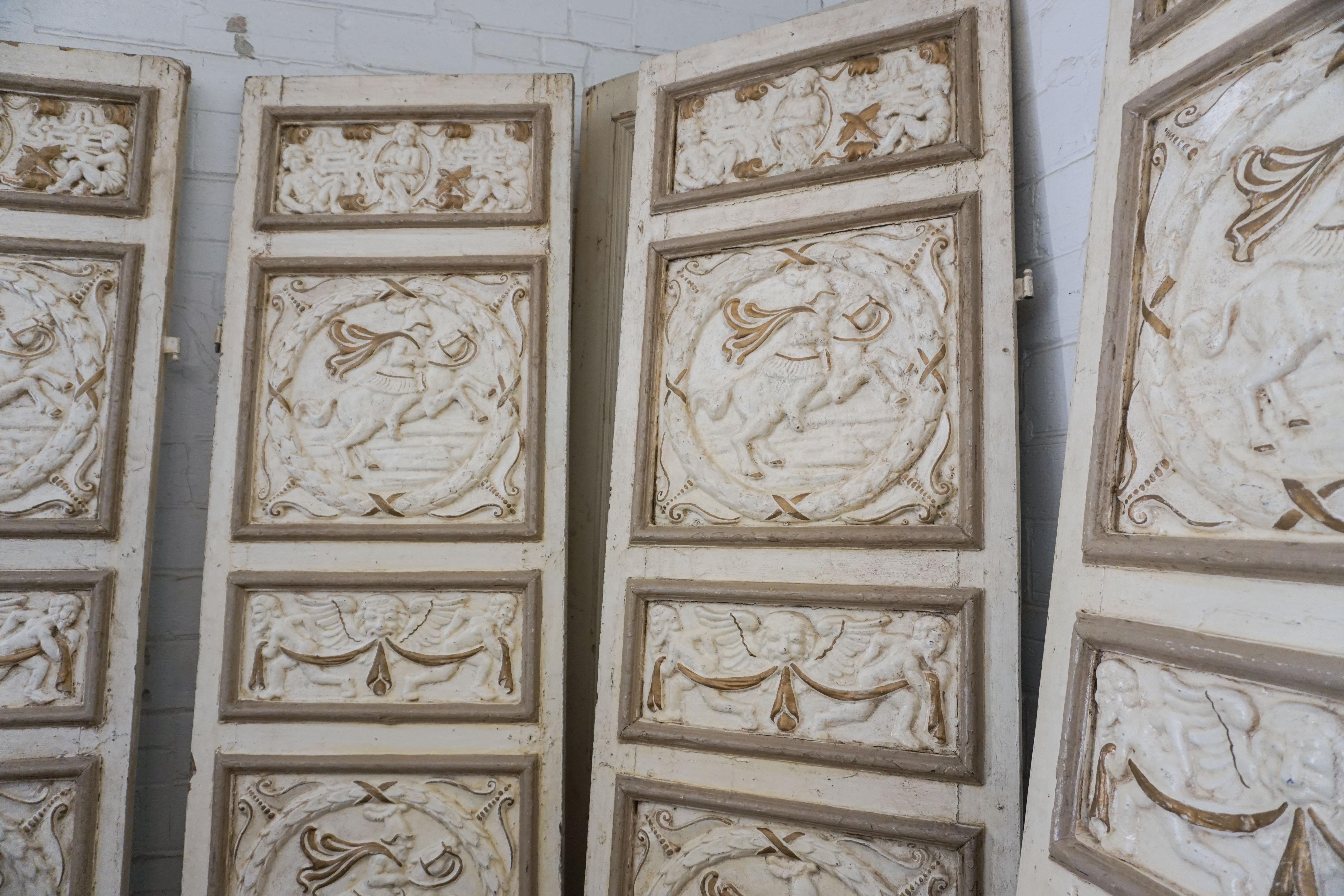 These ornate doors feature design on both sides. Four total in set.

Measurements: 93.5'' H x 27.5.