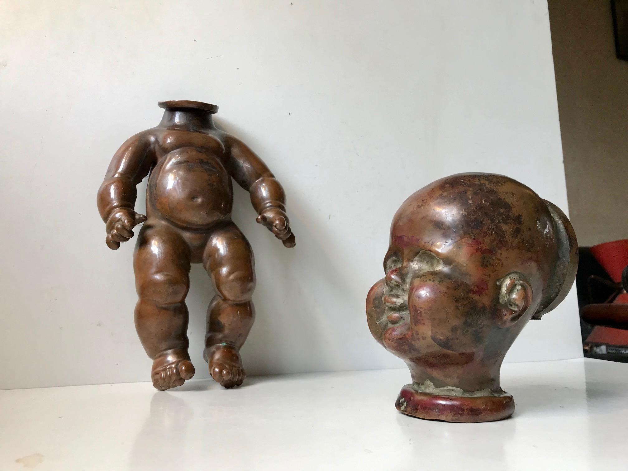 Complete and intact French doll mold in solid copper. Very early industrially used mold for production of rubber dolls. You very rarely see the body and head together. The mold is unusually detailed to the outside. Both parts has developed a