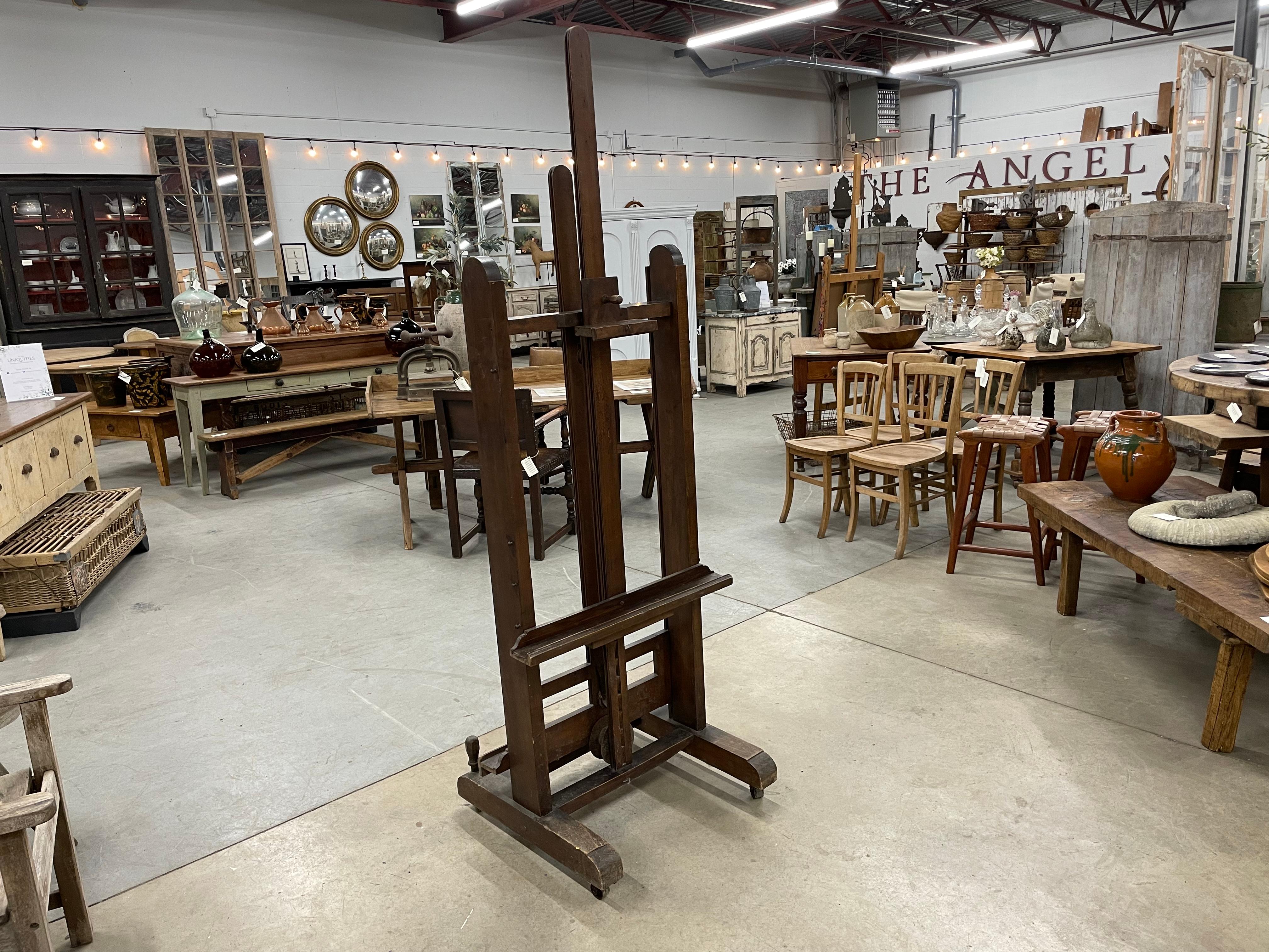 Antique artist’s double sided easel, with adjustable mechanism, raised up on trestle base terminating in casters.

Lovely old piece with beautiful patina.

Shortest height: 67.0