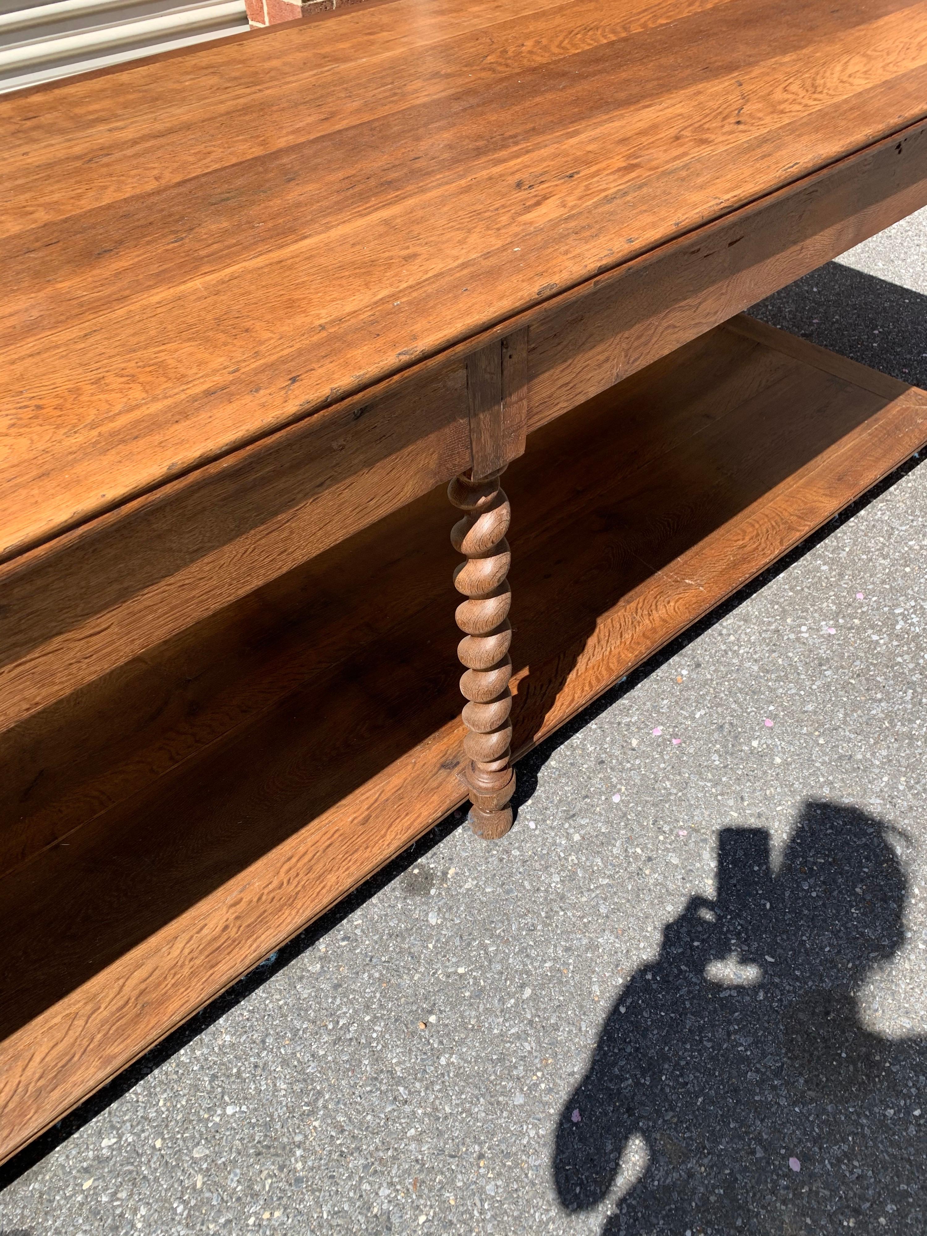 Monumental draper’s table. Size means was probably used in a textile factory. Six barley twist legs and two drawers, circa 1900. Completely restored.