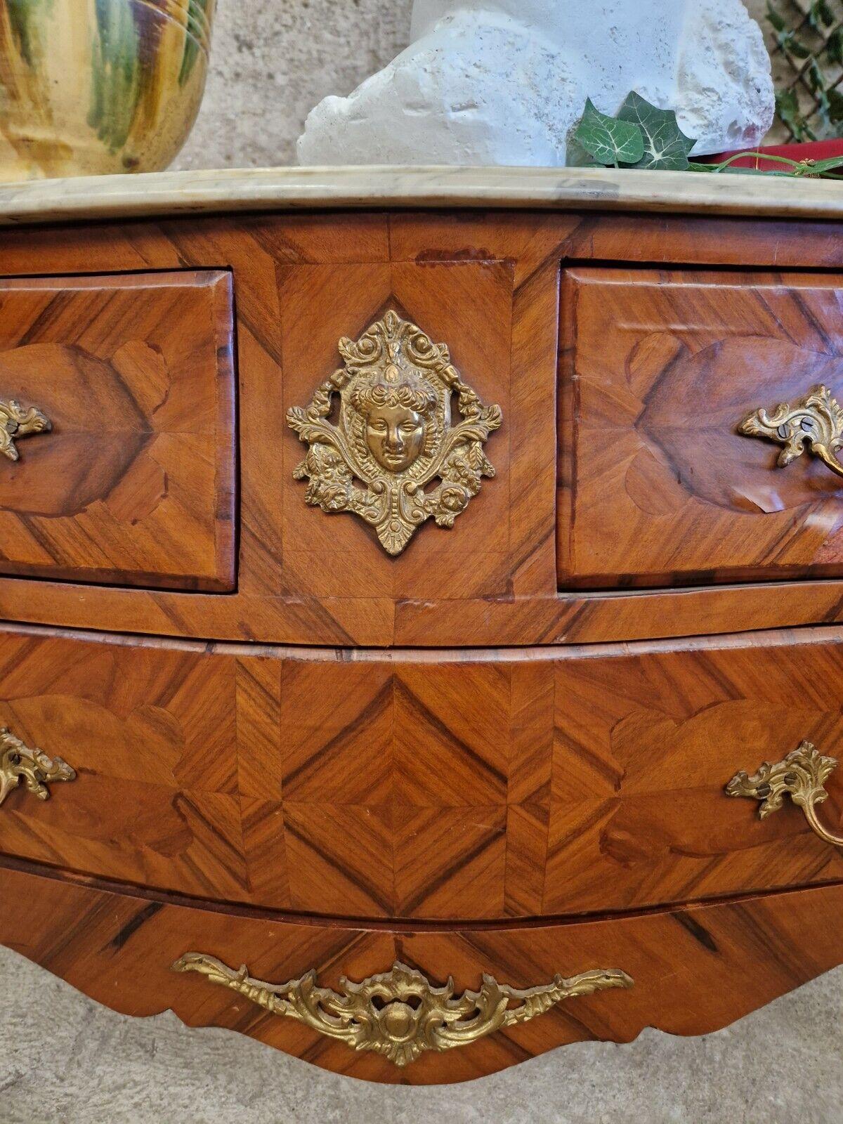 Fabulous Large Bombe Chest of Drawers 

French Baroque Style Bombe Chest of Drawers 

Antique allow for signs of age and use 

Shaped Marble Top  (Chip to corner)

Walnut Inlays (a few chips see images)

2 Drawers 

Gilt Bronze Decorative Work

20th