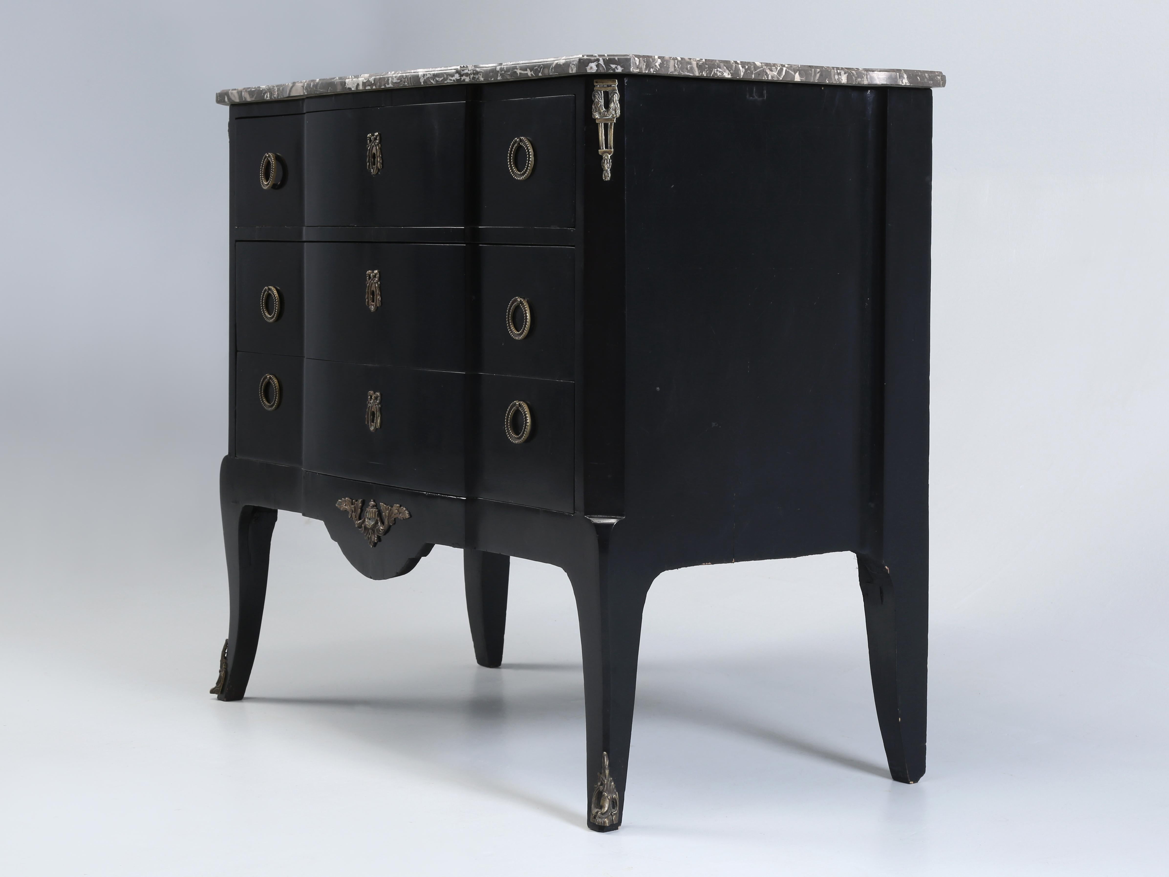 Antique French Ebonized Louis XV Style Commode or French Dresser that just came out of our Restoration department and is ready for immediate delivery. Our Antique Ebonized French Commode was stripped down to the bare wood and an old-fashioned black