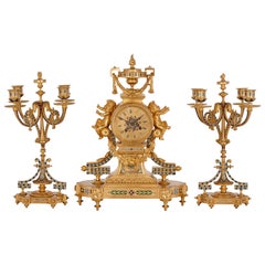 Antique French Eclectic Style Enamel and Gilt Bronze Clock Set