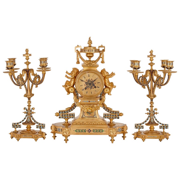 Antique French Eclectic Style Enamel and Gilt Bronze Clock Set For Sale
