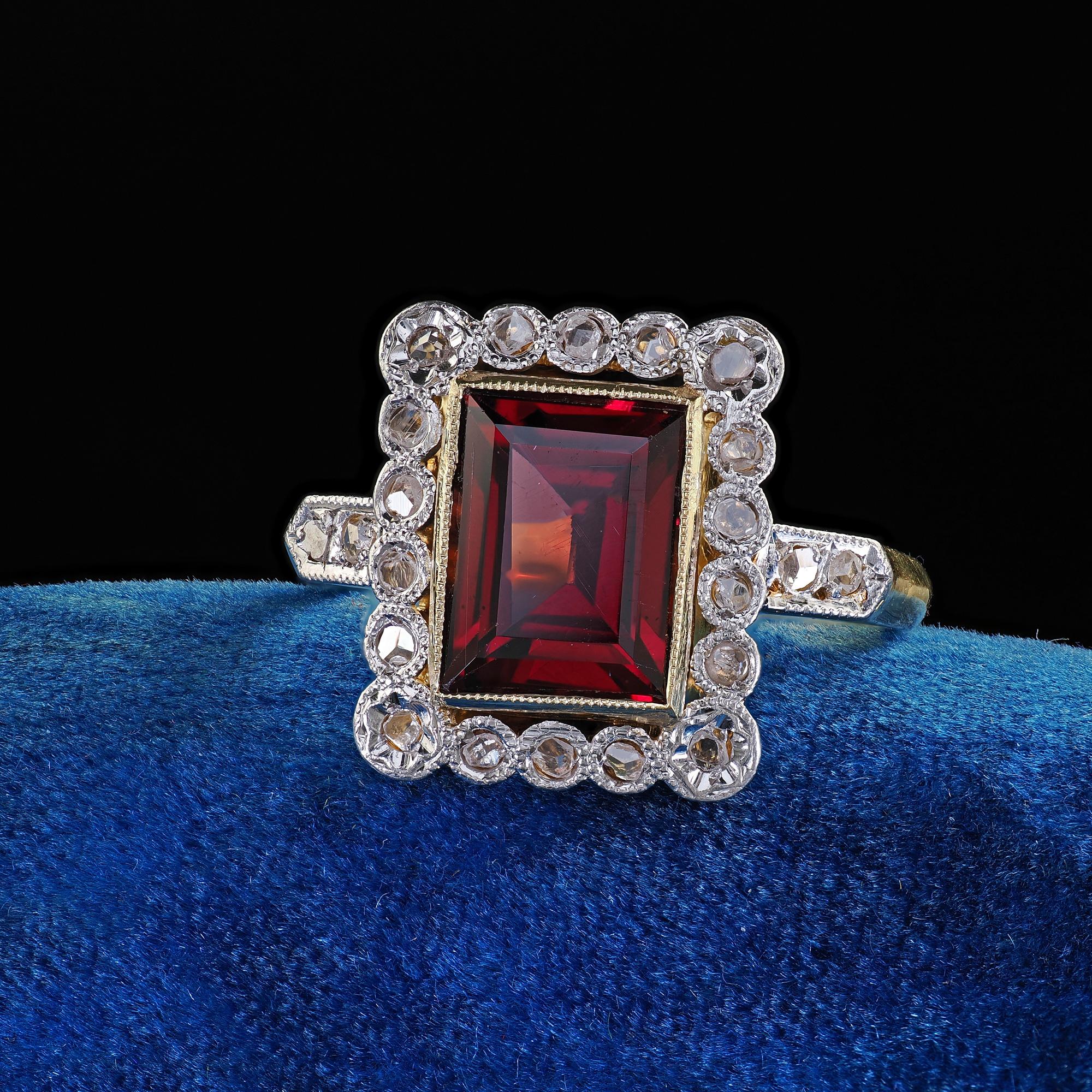Beautiful Antique French Edwardian 18K Yellow Gold Rose Cut Diamond Garnet Engagement Ring. This beautiful Edwardian rose cut diamond and garnet ring is crafted in 18k yellow gold. The ring features a square cut garnet in the center and is