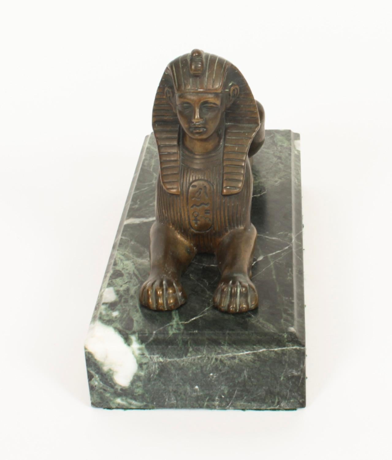 This is a fine antique 19th centurybronze Egyptian Revival figure of a recumbent sphinx raised on a decorative verde antico marble rectangular plinth.
 
It is a fine piece which will look beautiful wherever placed.
 
Condition:
In excellent