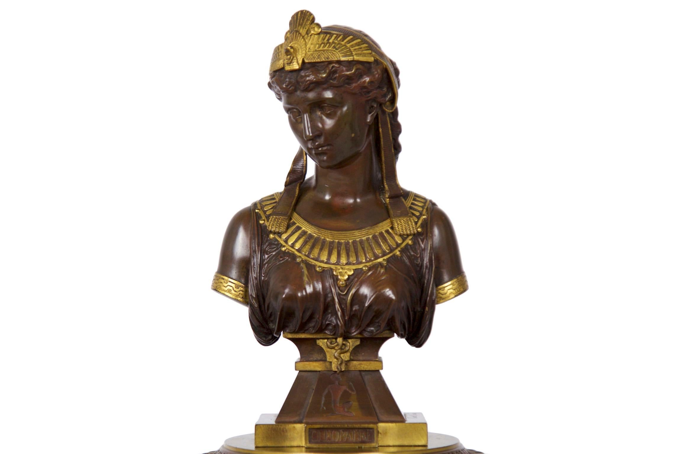This precisely modeled and incredibly attractive work by Eutrope Bouret was likely cast during the last ten years of the nineteenth century, the quality and detail of the sculpture being exceedingly fine. The bust depicts Cleopatra with a spread