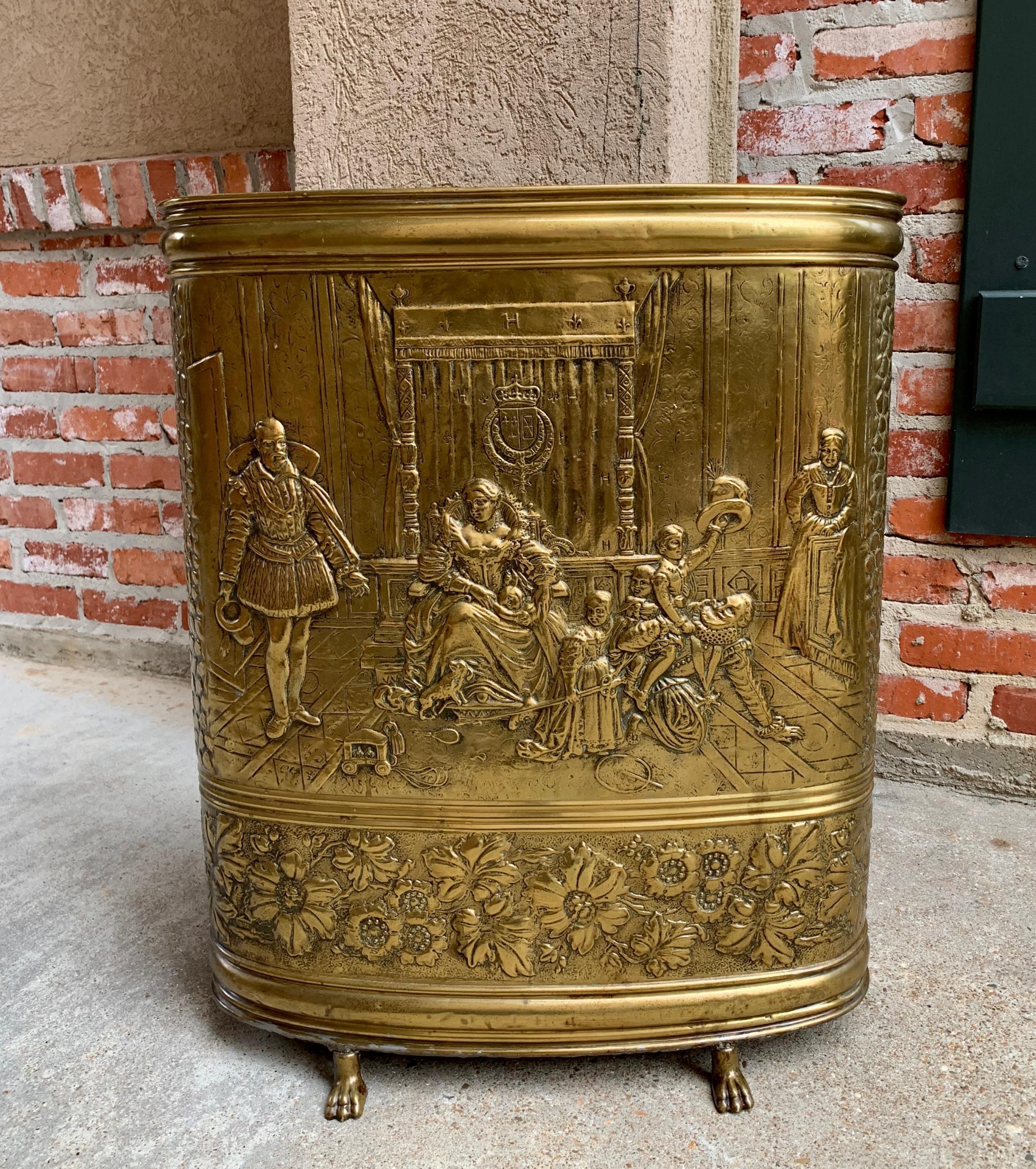 Antique French embossed brass repousse oval umbrella stand Renaissance 

~Direct from France~
~Lovely antique embossed brass French umbrella stand~
~Large detailed repousse design of French royalty and their children beneath large family crest.