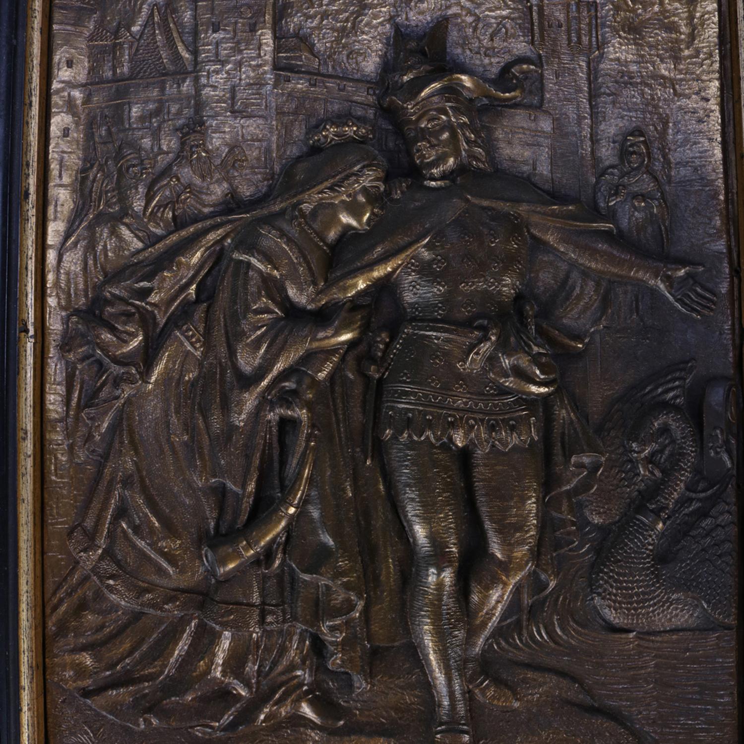 An antique French embossed bronze plaque features courting scene of couple outside the city gates and seated in carved wood frame gilt decorated with English ivy, reminiscent of a Shakespeare scene, circa 1890.

Measures: Frame 13.25