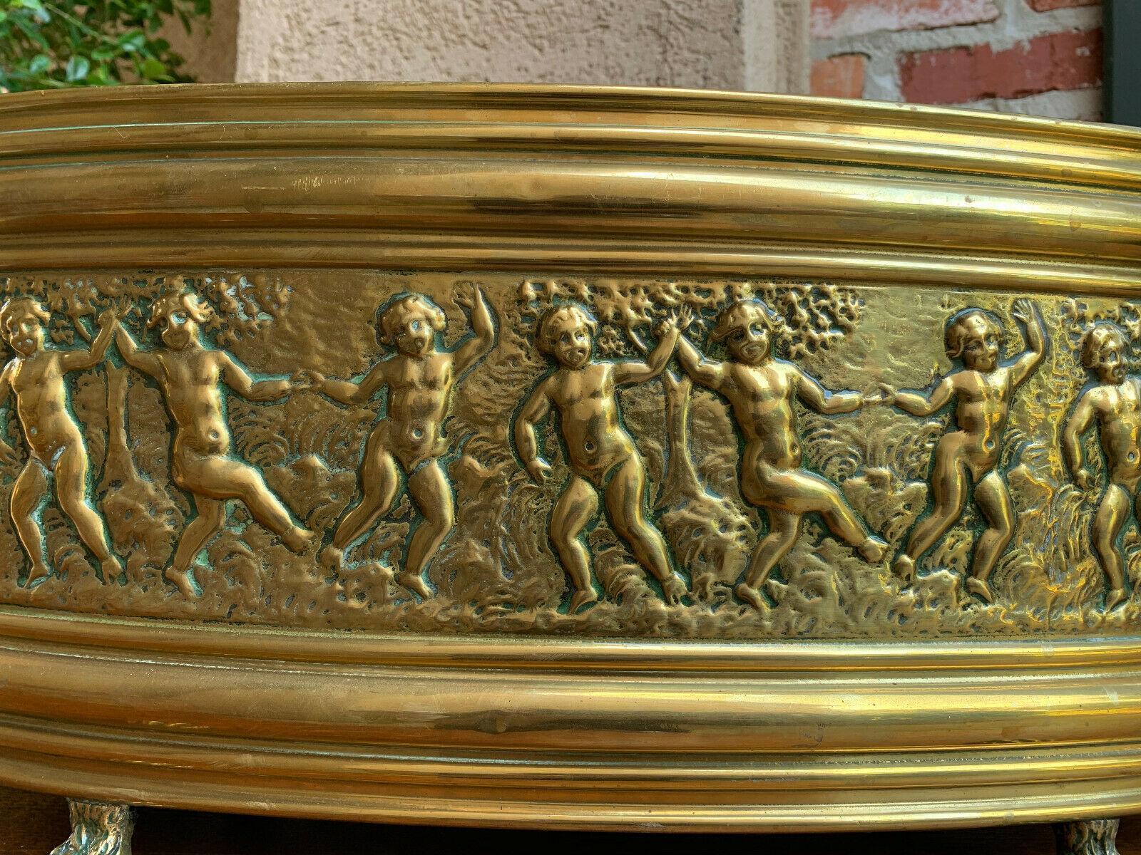 Antique French Embossed Repousse Brass Jardinière Oval Planter Cache Pot Cherub In Good Condition In Shreveport, LA