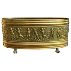 Antique French Embossed Repousse Brass Jardinière Oval Planter Cache Pot Cherub