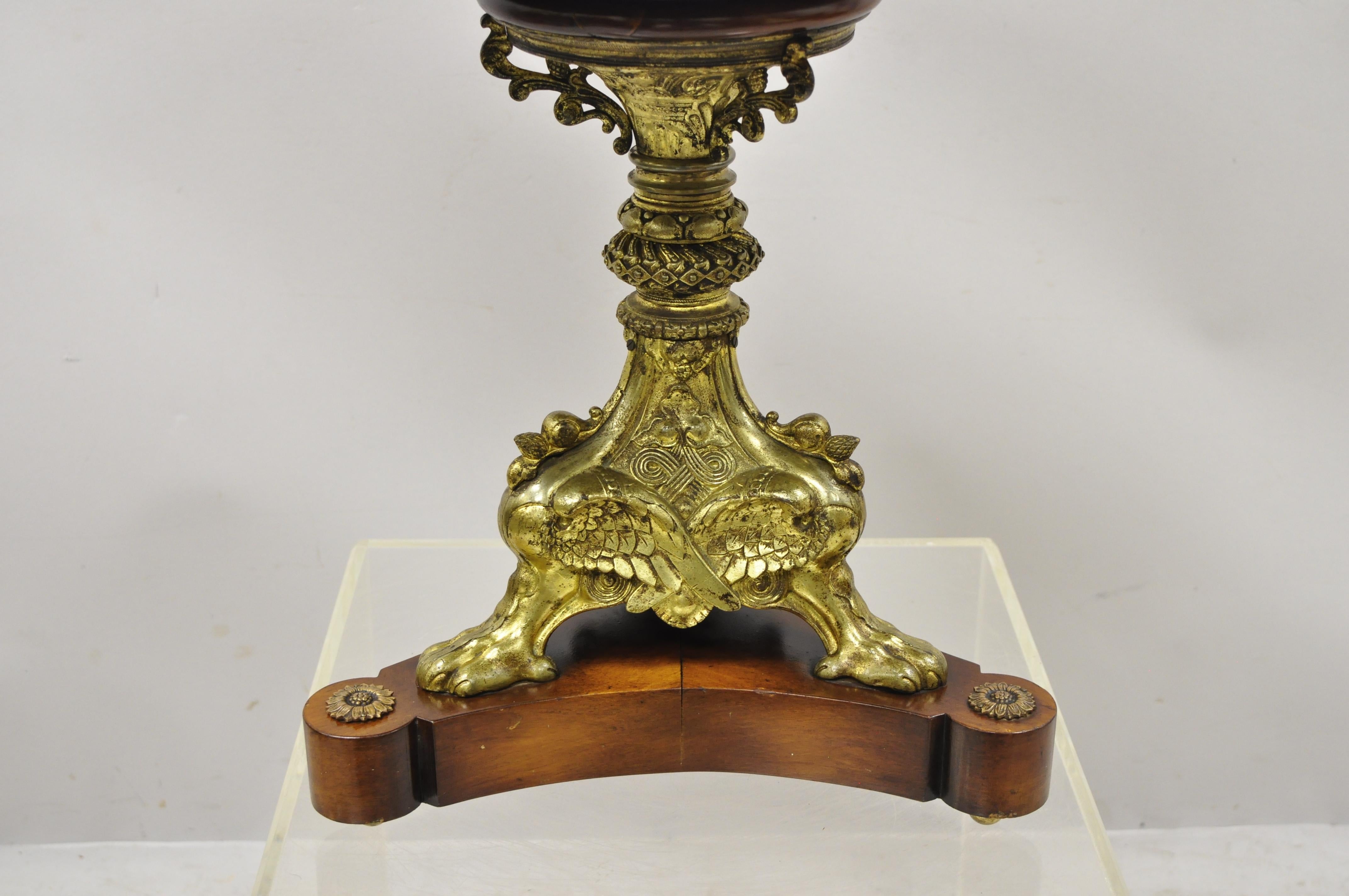 Antique French Empire bronze figural swans paw feet pedestal base round low side table. Item features ornate bronze pedestal base with swans and paw feet, beautiful wood grain, very nice antique item, quality craftsmanship, great style and form.